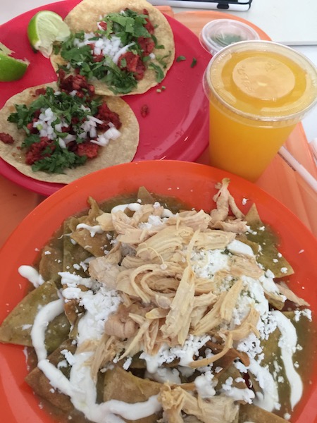 Chilaquiles, preferably with green tomatillo salsa and shredded chicken