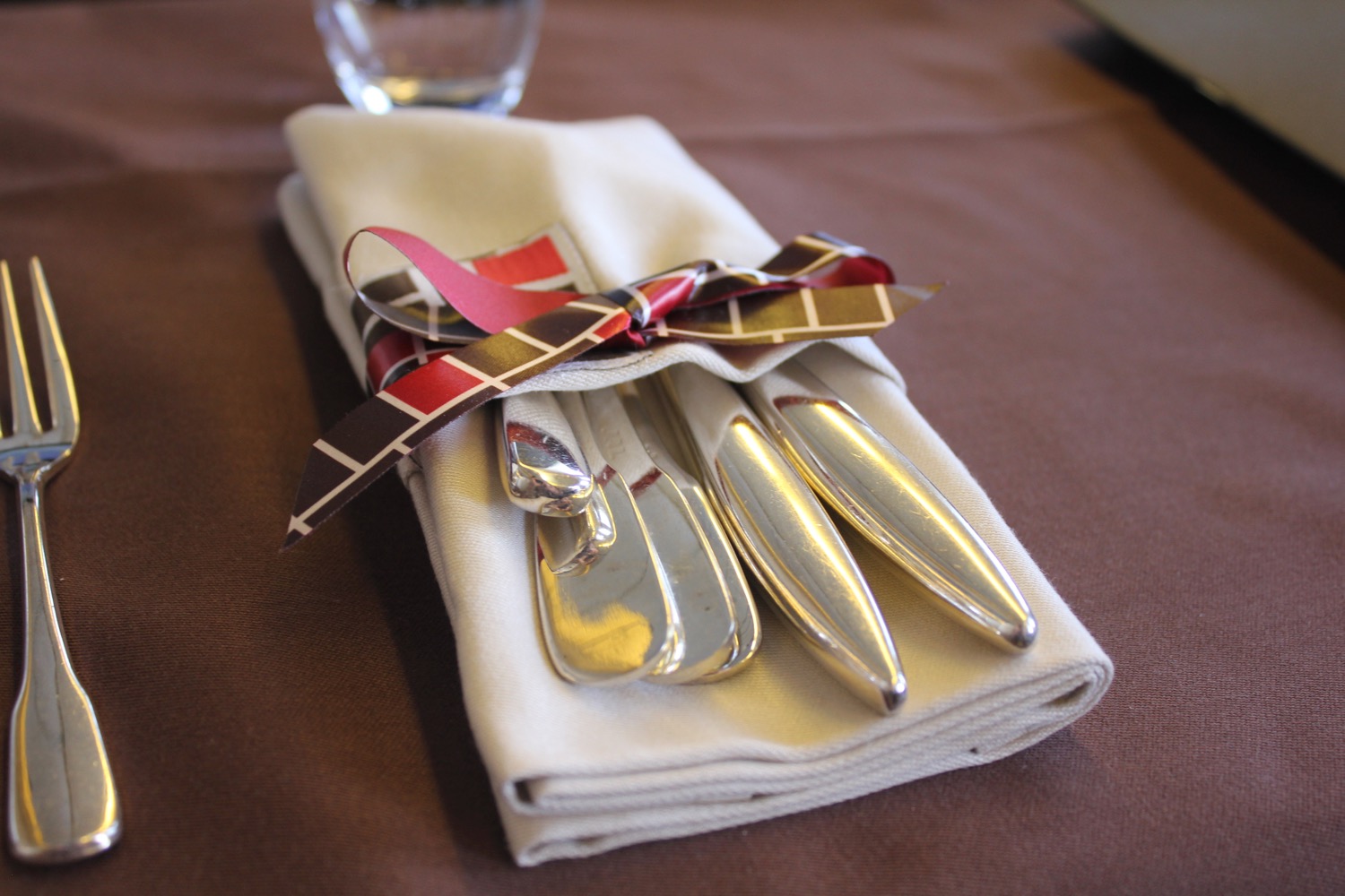 a silverware wrapped in a napkin