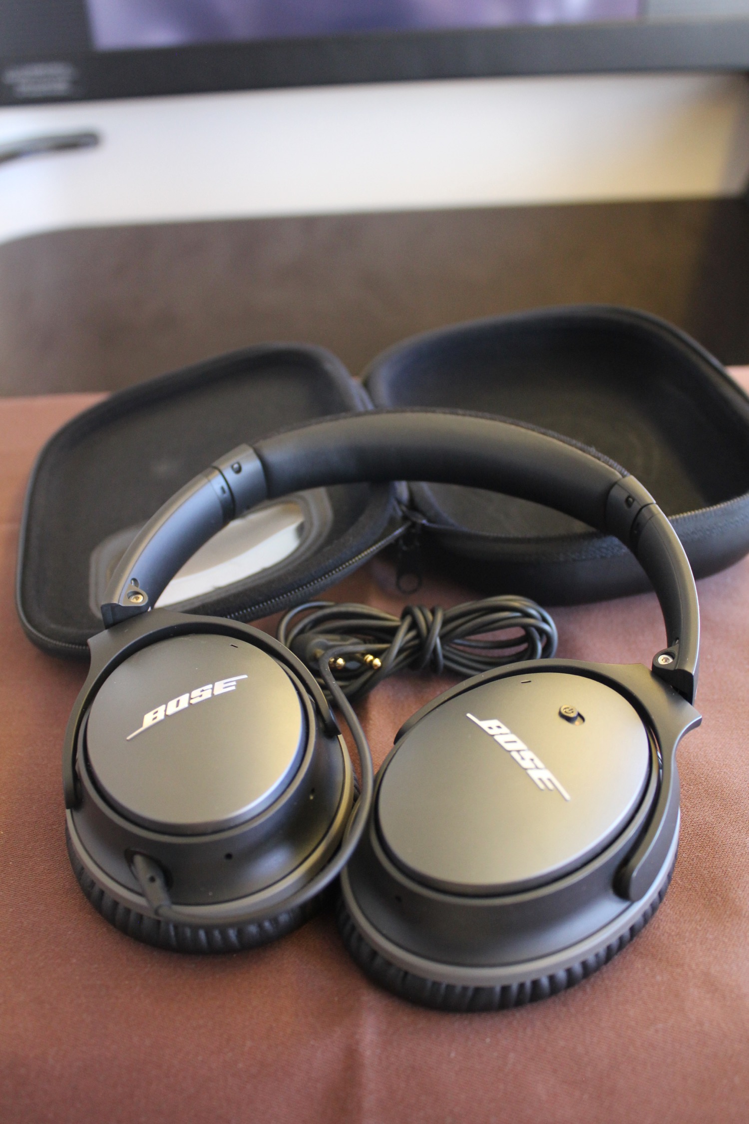 a pair of headphones with a case