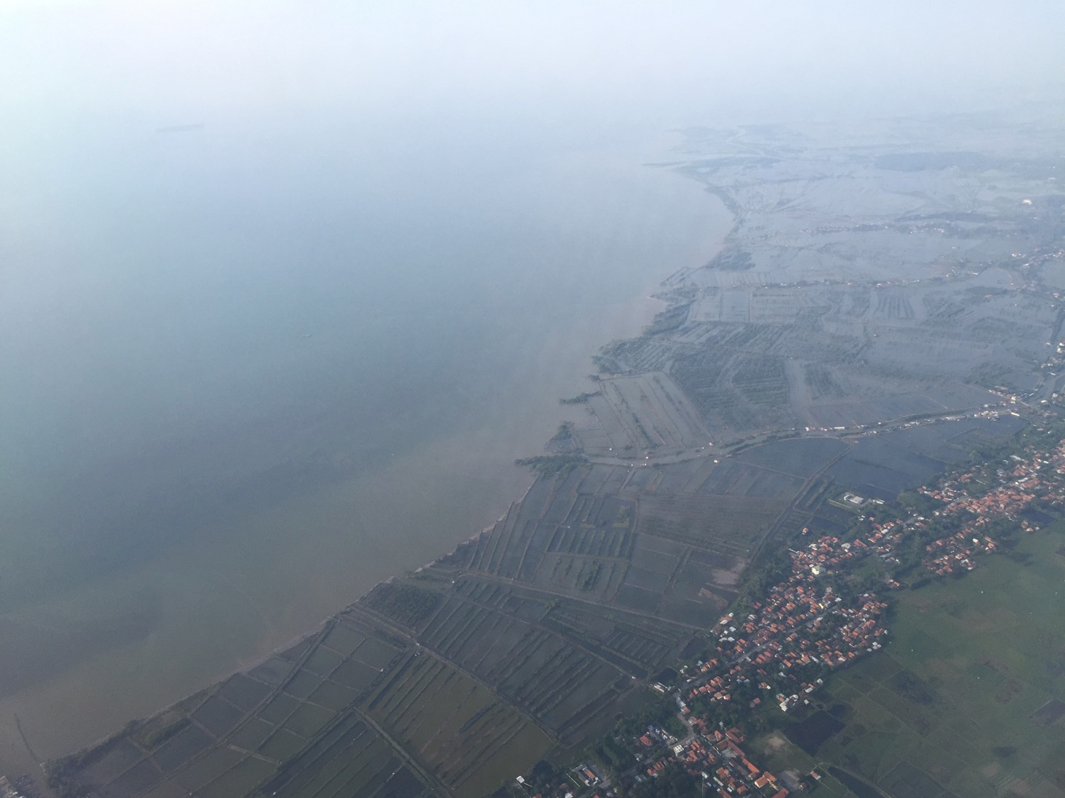aerial view of a body of water and land