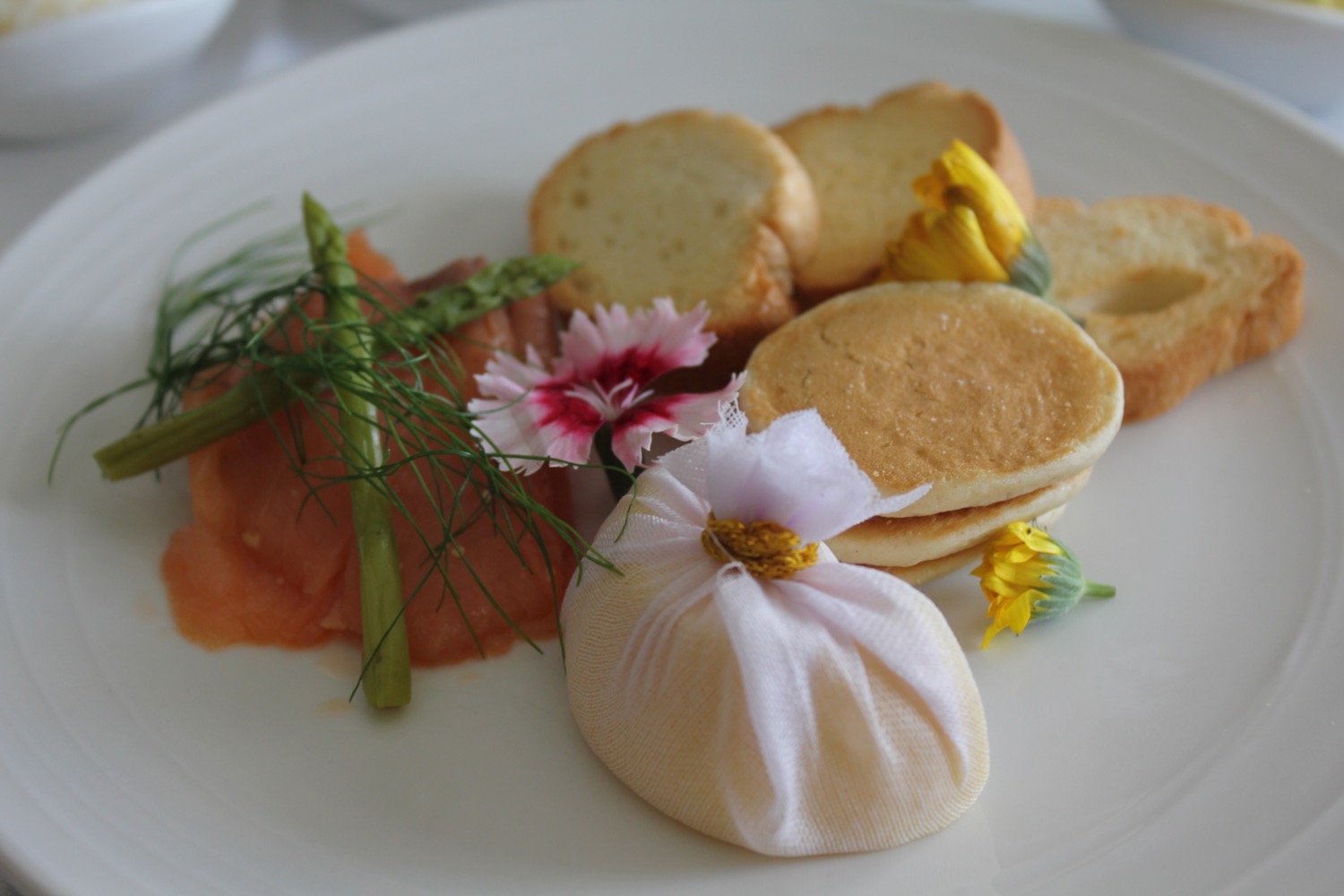 a plate of food with flowers