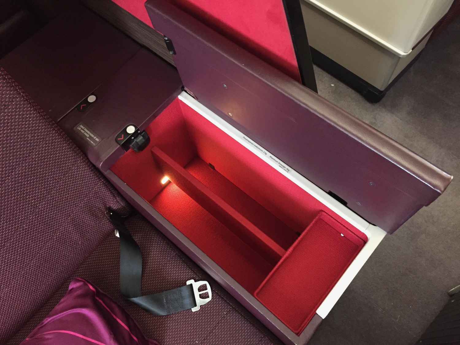a red and black box with a light inside