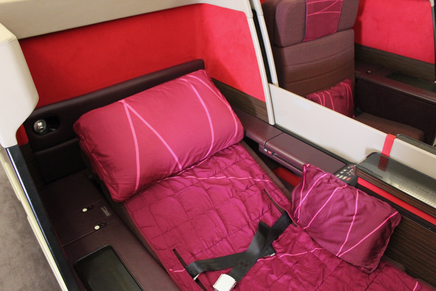 a bed with a seat belt and a seat belt on it