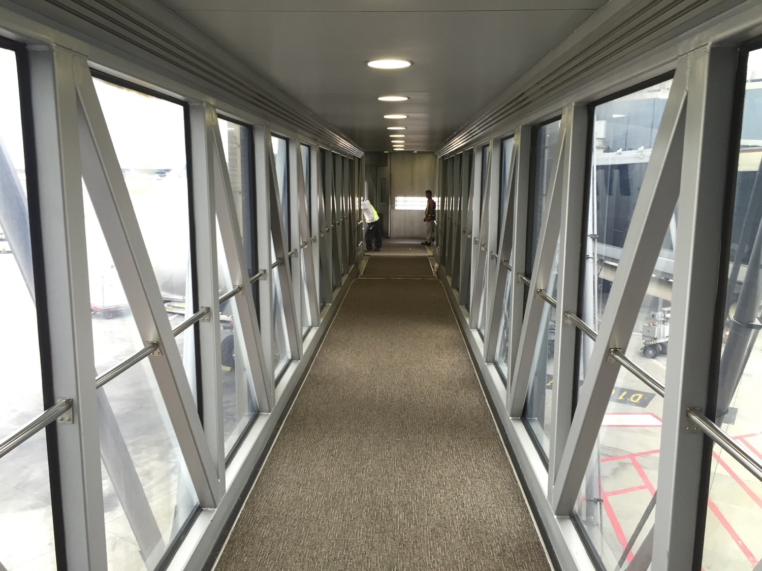 a long hallway with windows