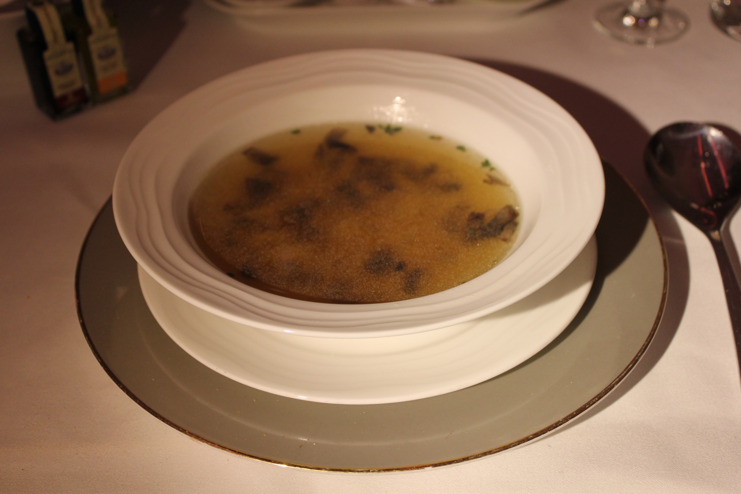 a bowl of soup on a plate