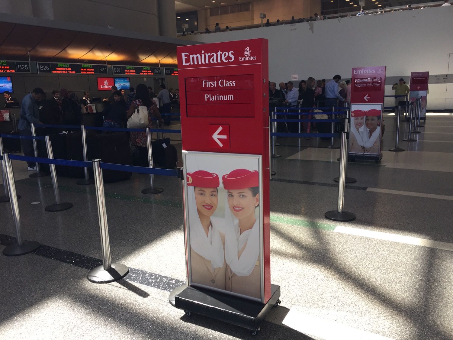 a red sign with a picture of a woman in a red hat