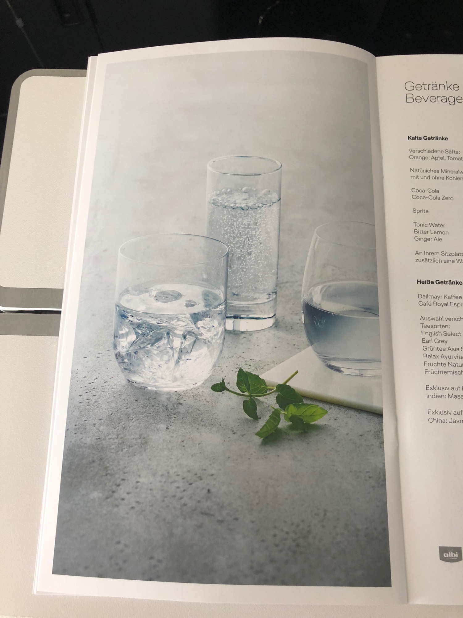 a book with a picture of a couple of glasses of water
