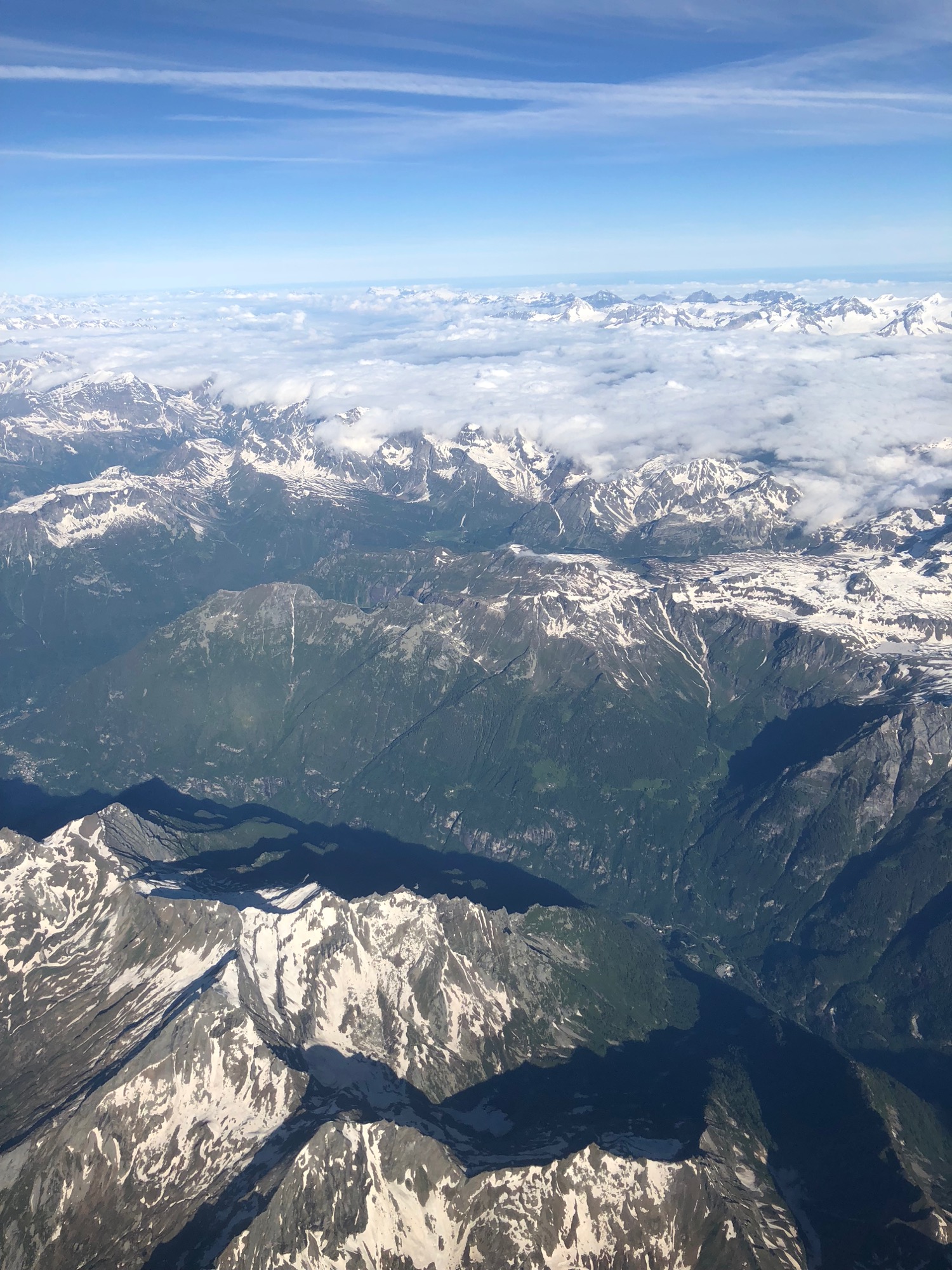 aerial view of mountains and clouds