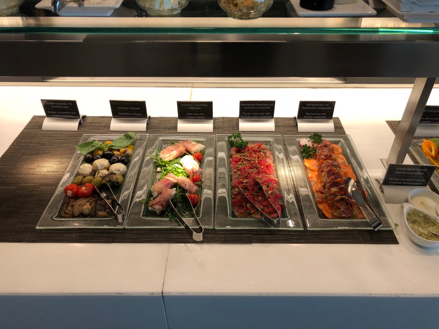 a row of food in a buffet