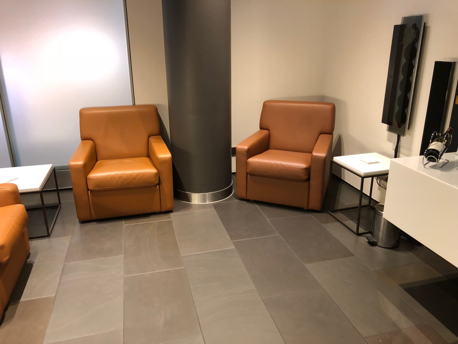two brown chairs in a room
