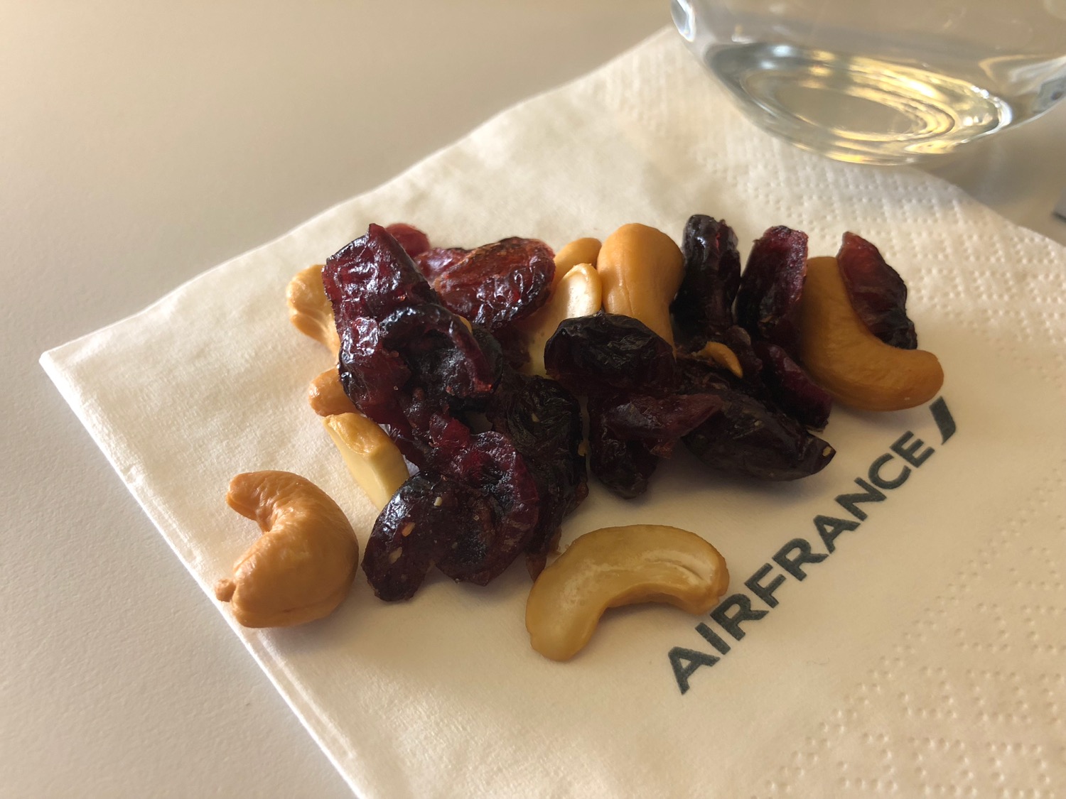 a pile of nuts and dried fruits on a napkin