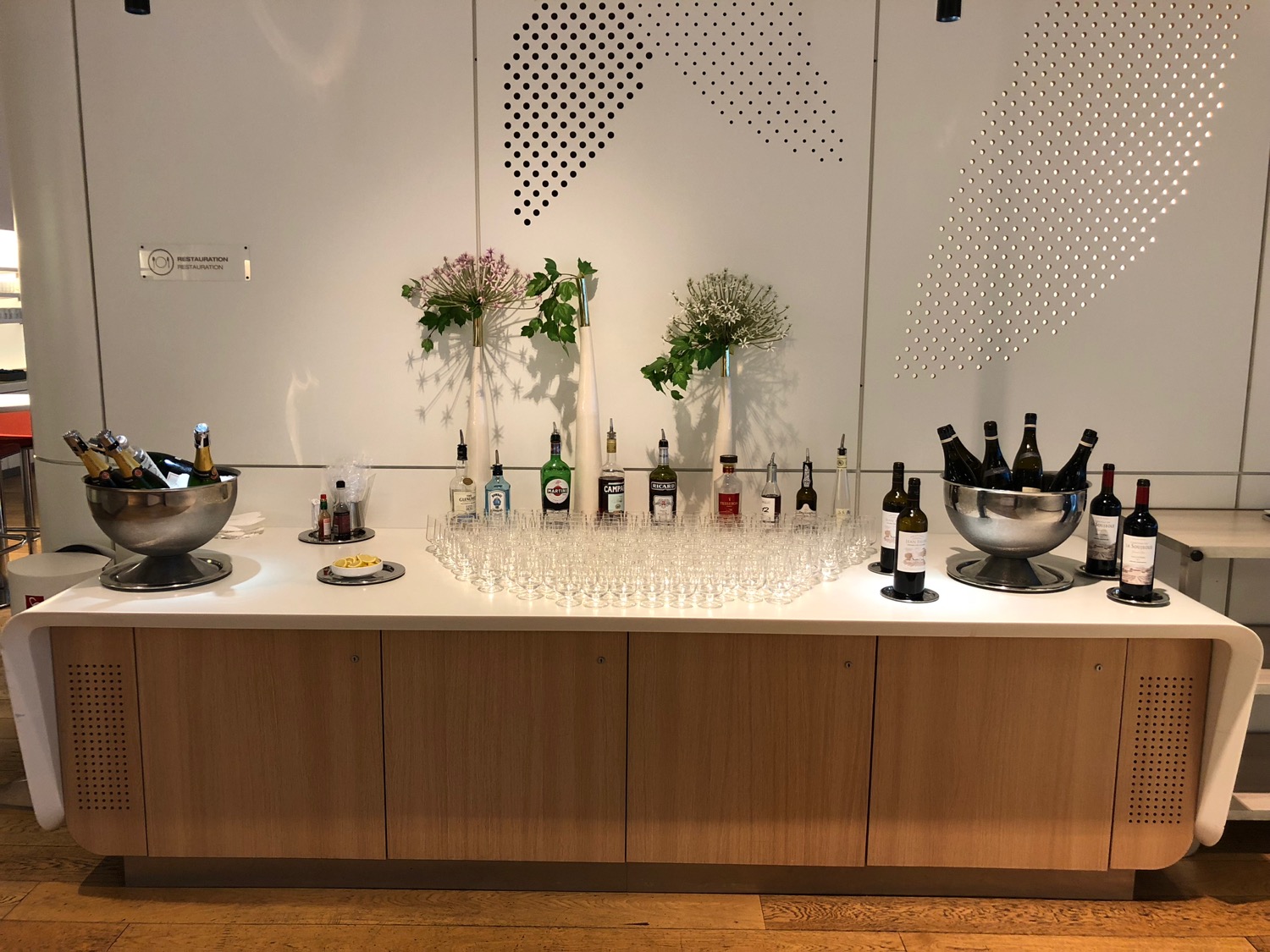 a table with bottles and glasses on it