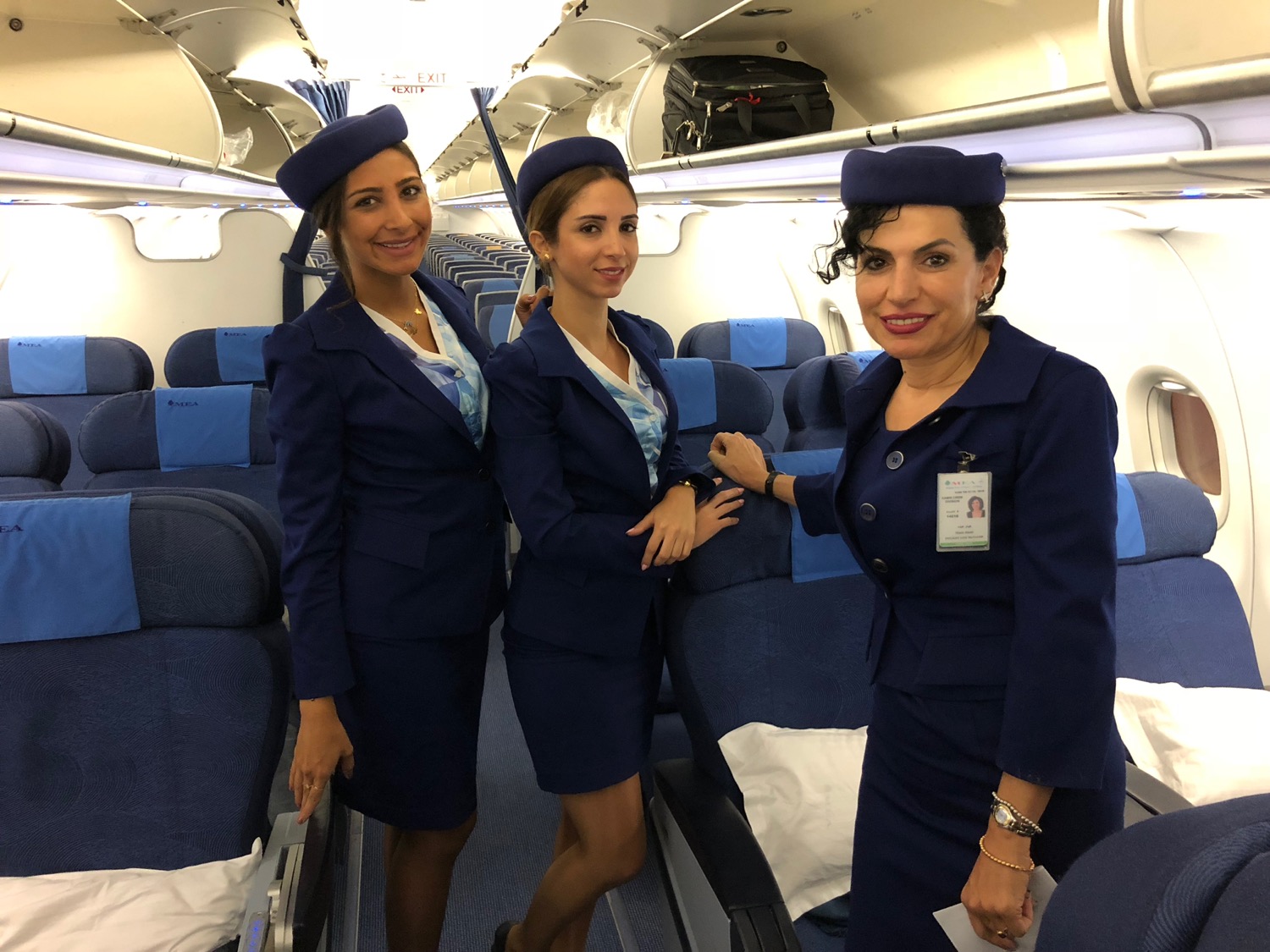 a group of women in blue uniforms