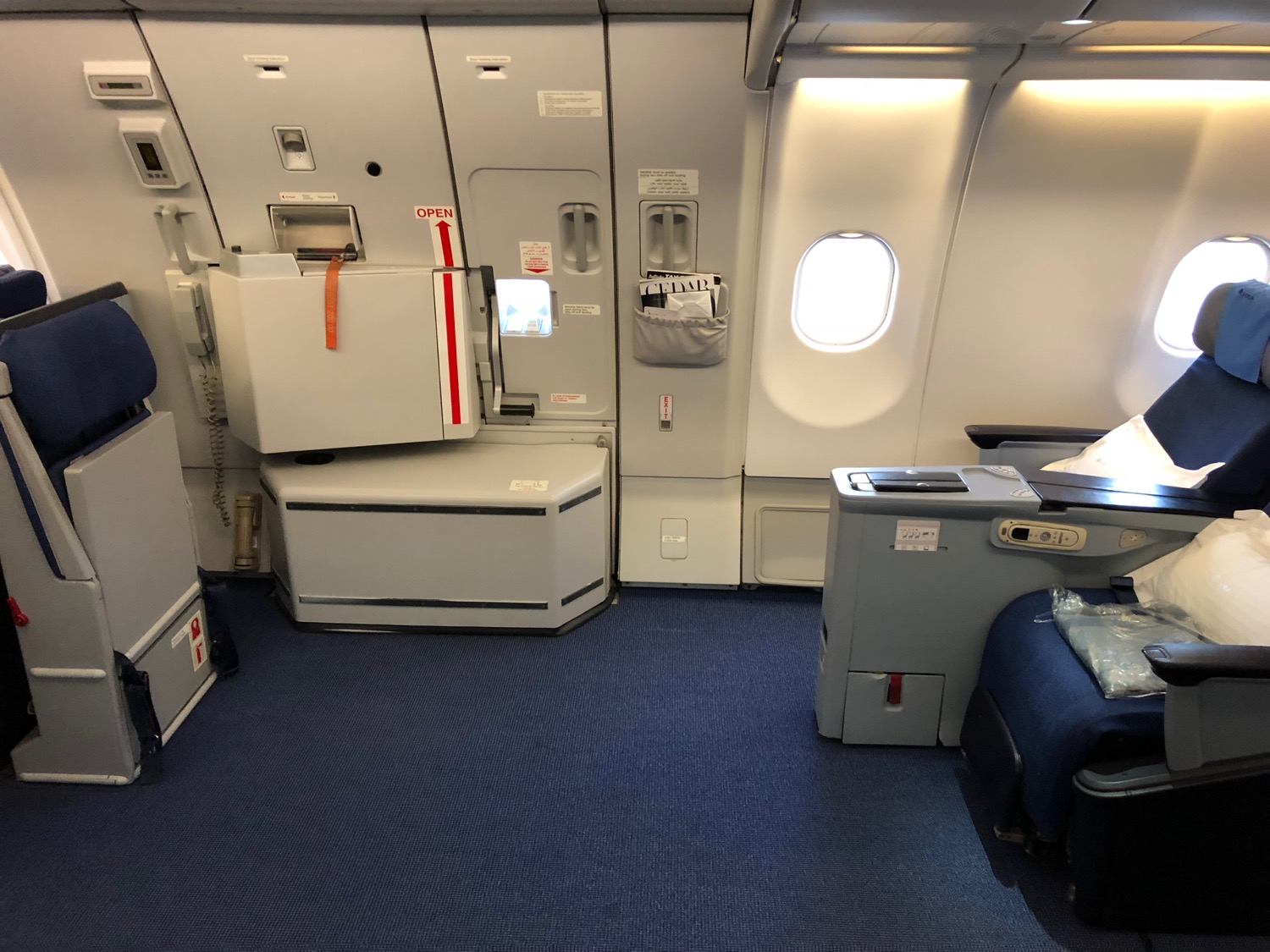 an airplane with a refrigerator and a window