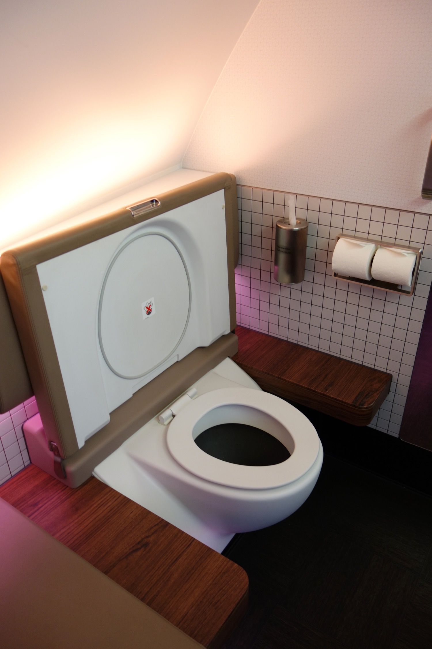 a toilet with a seat up