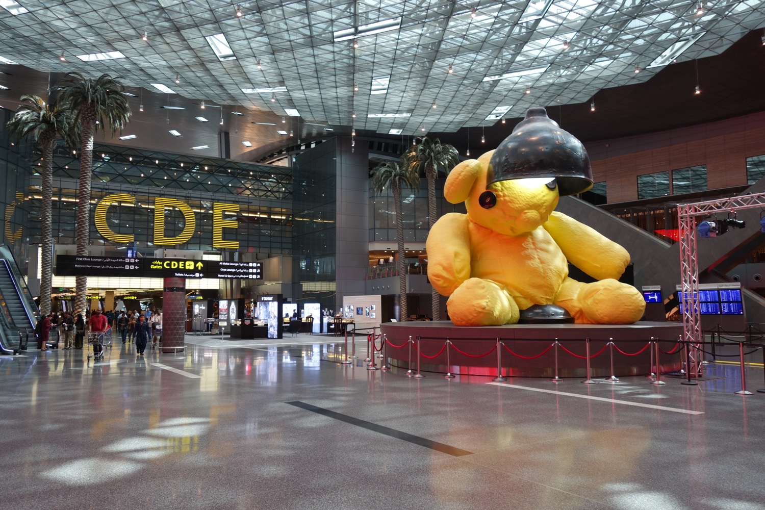 a large stuffed bear in a large building
