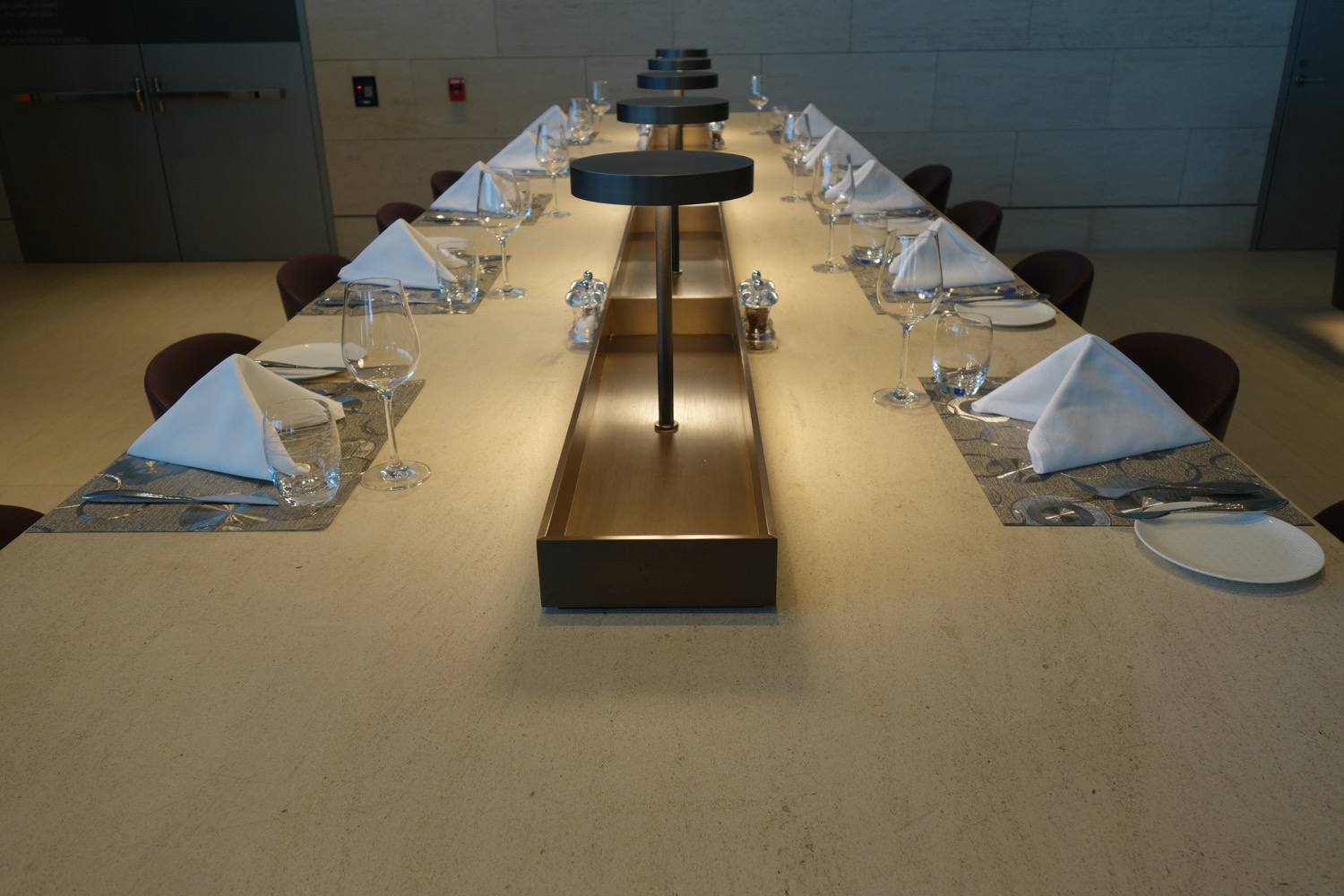 a long table with a black round object on it