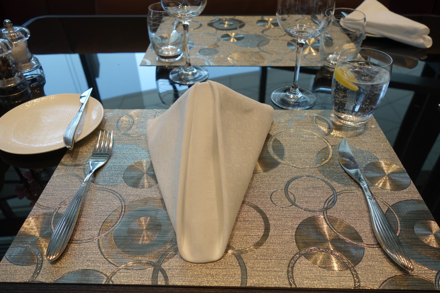 a table with a napkin folded on it