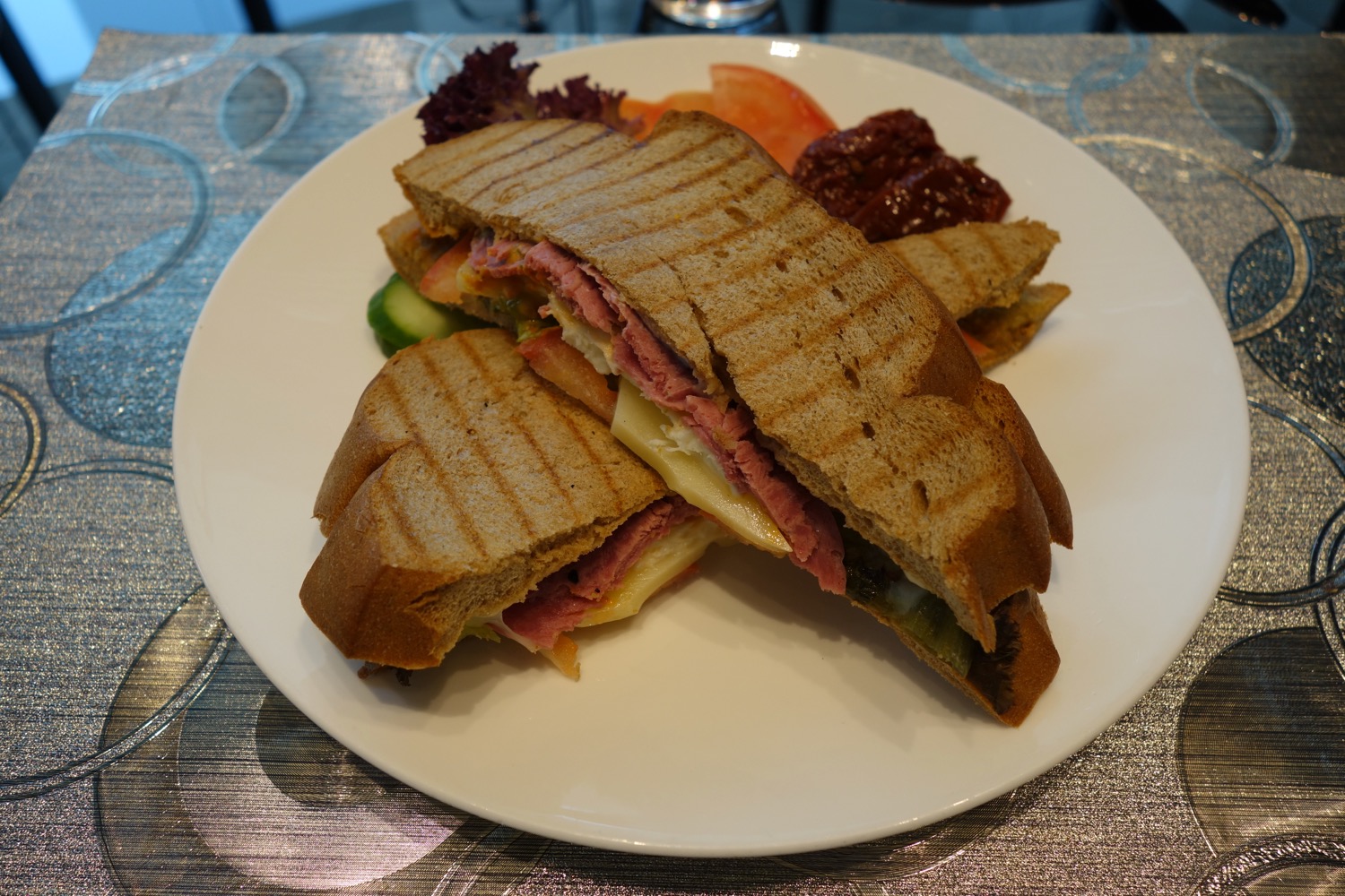 a plate of sandwiches on a table