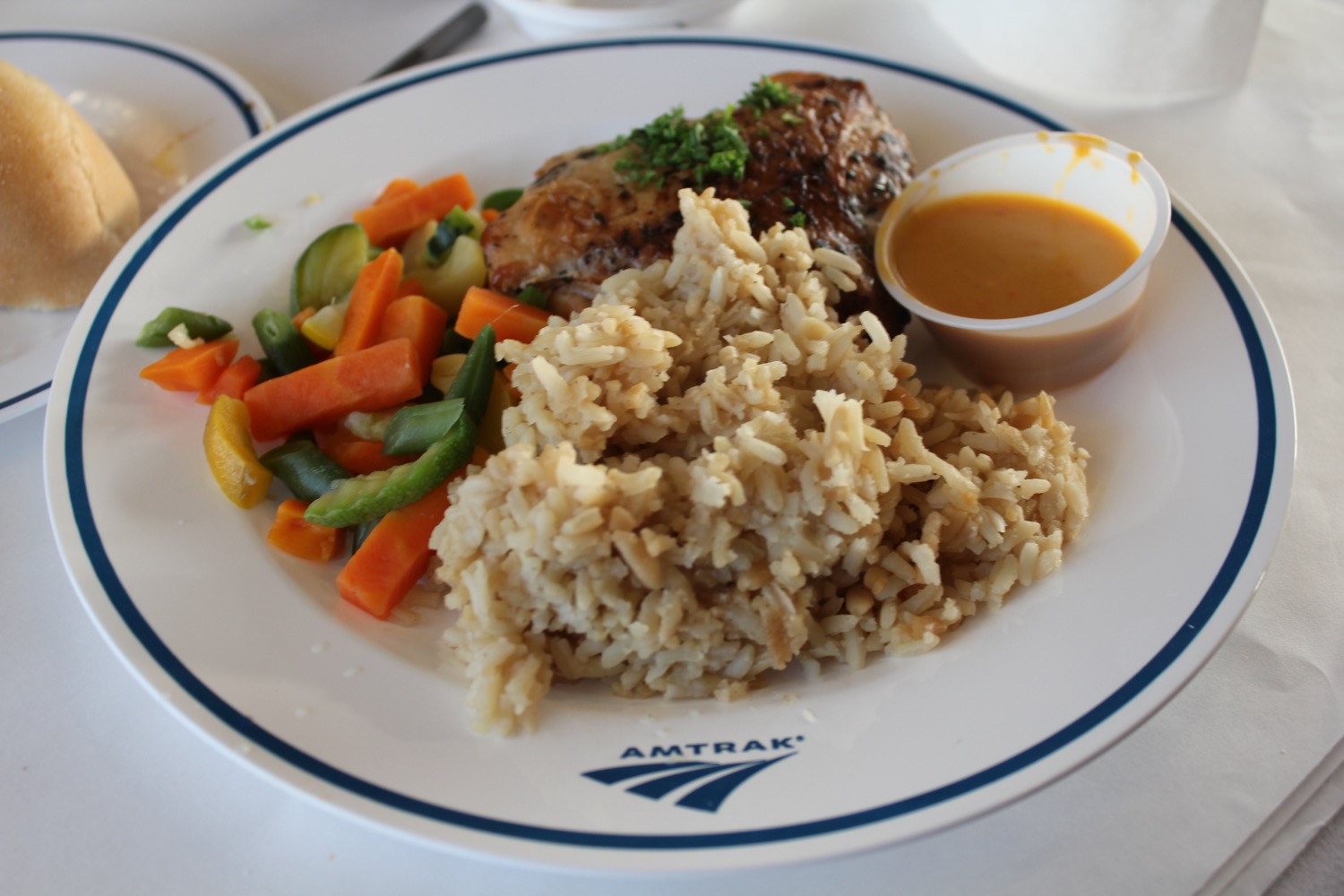 a plate of food with a sauce and rice