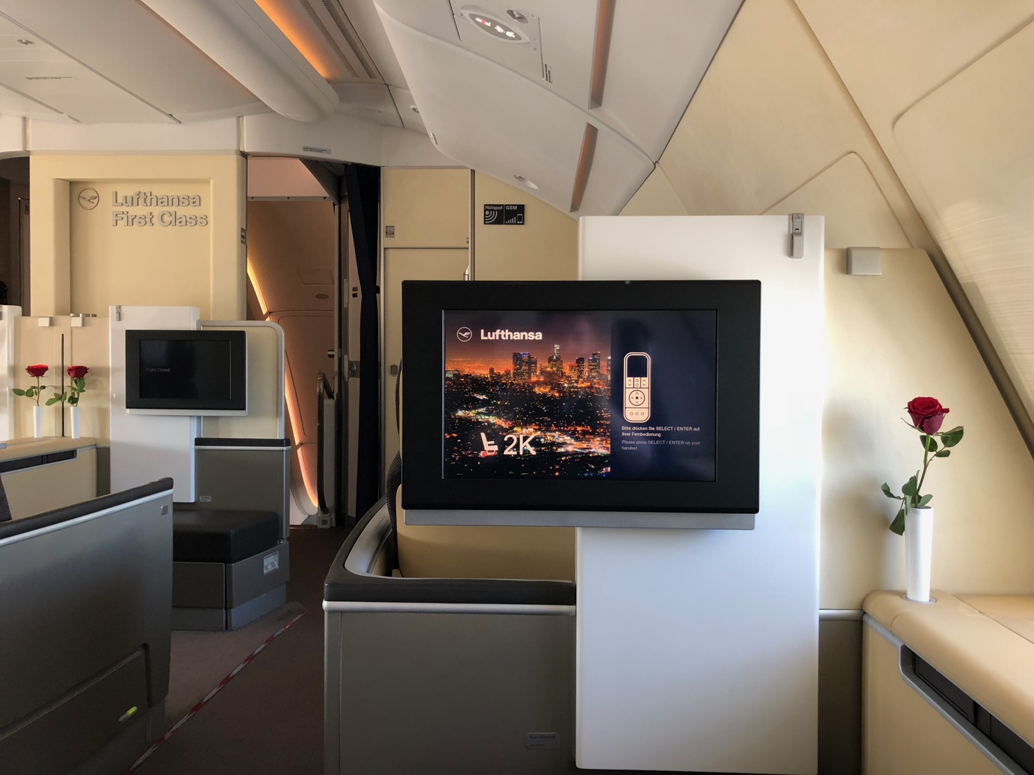 a tv on a stand in a plane