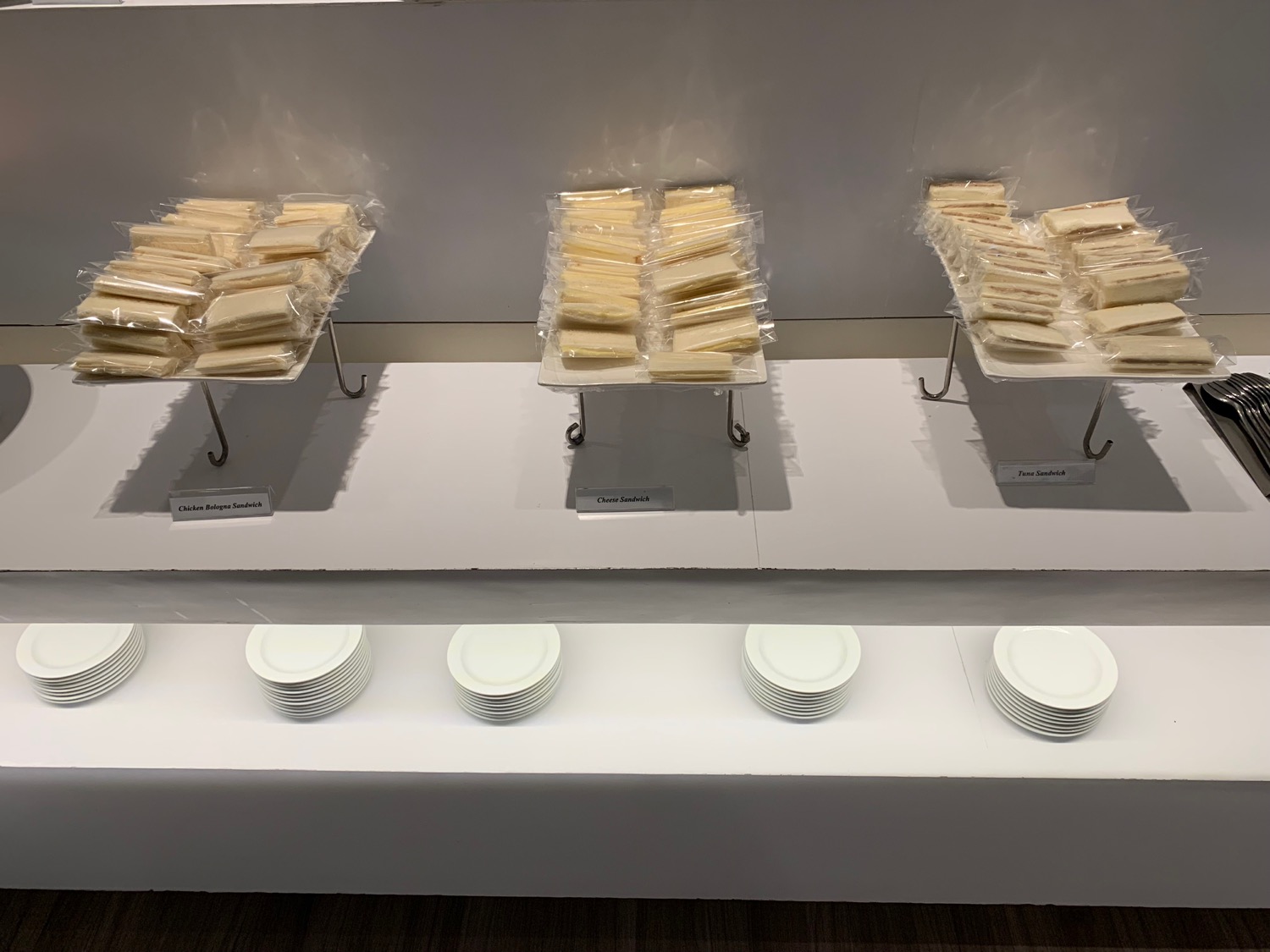 a row of plates with food on them