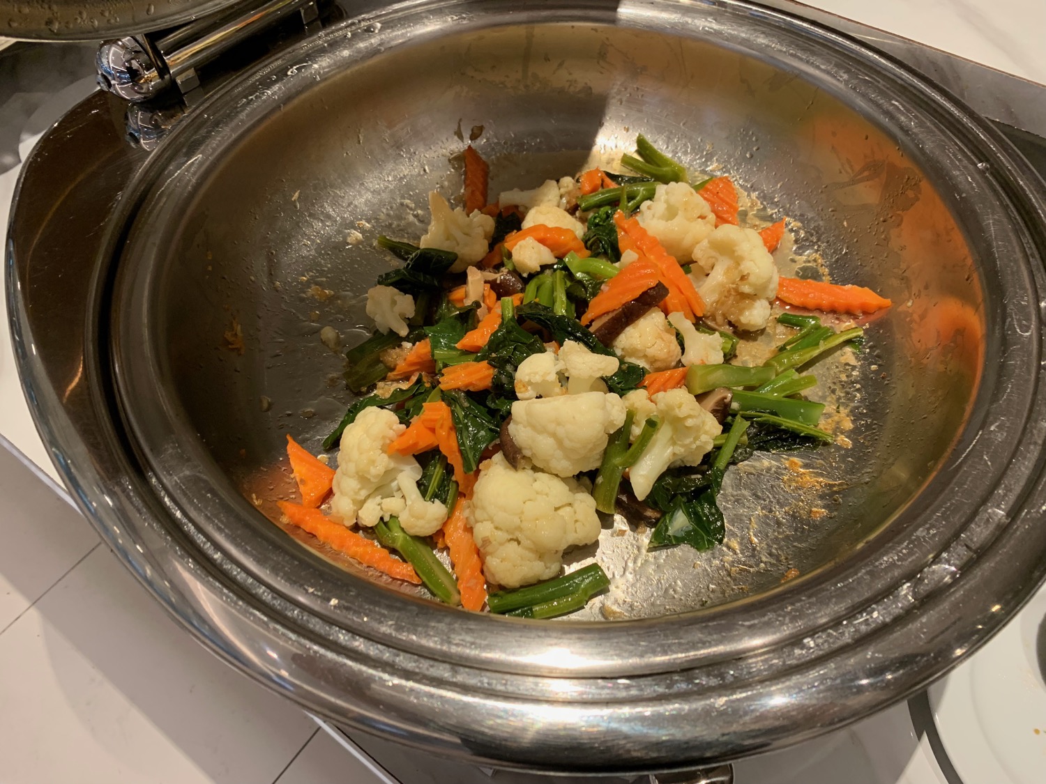 a bowl of vegetables in a pan