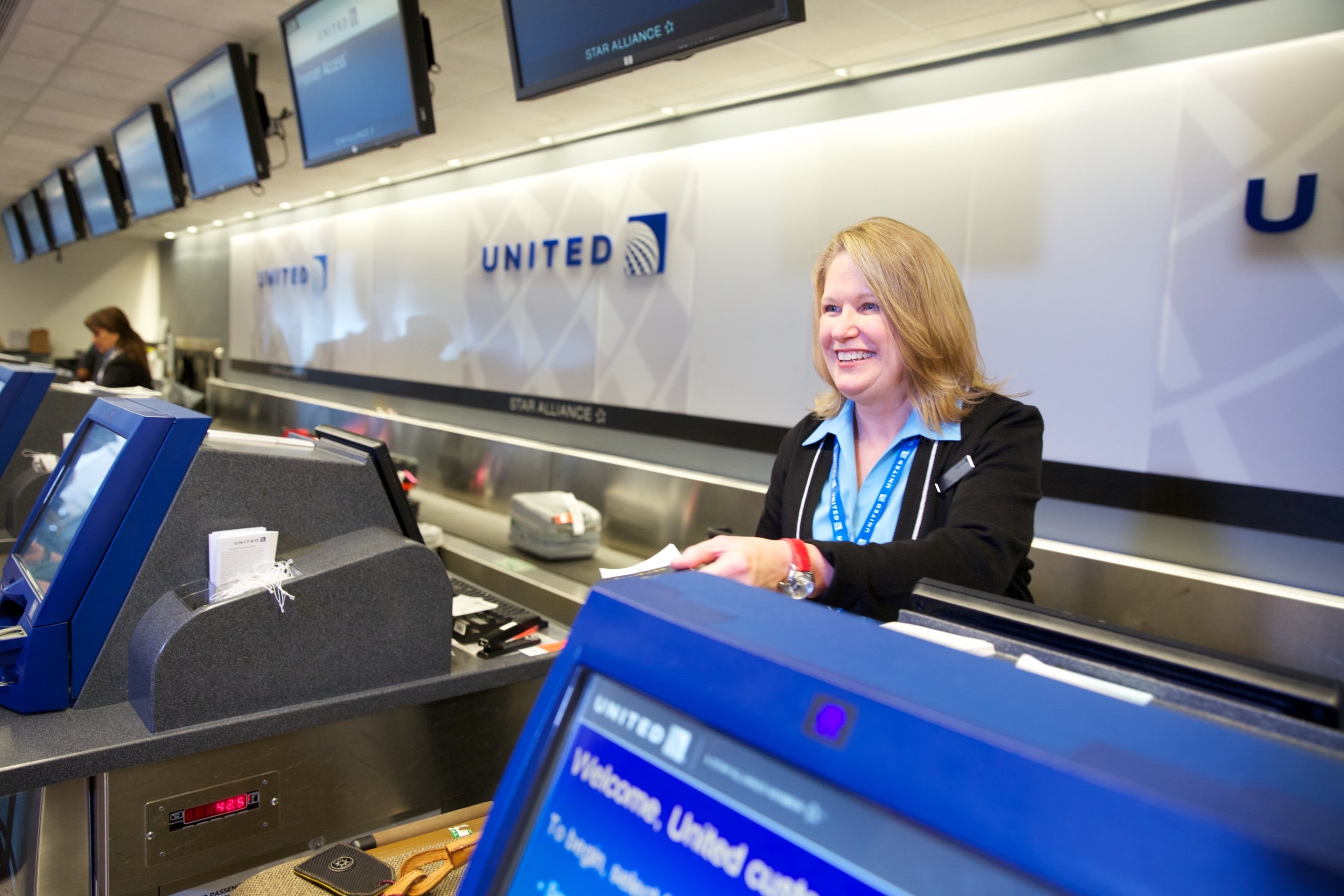a woman at a check-in counter