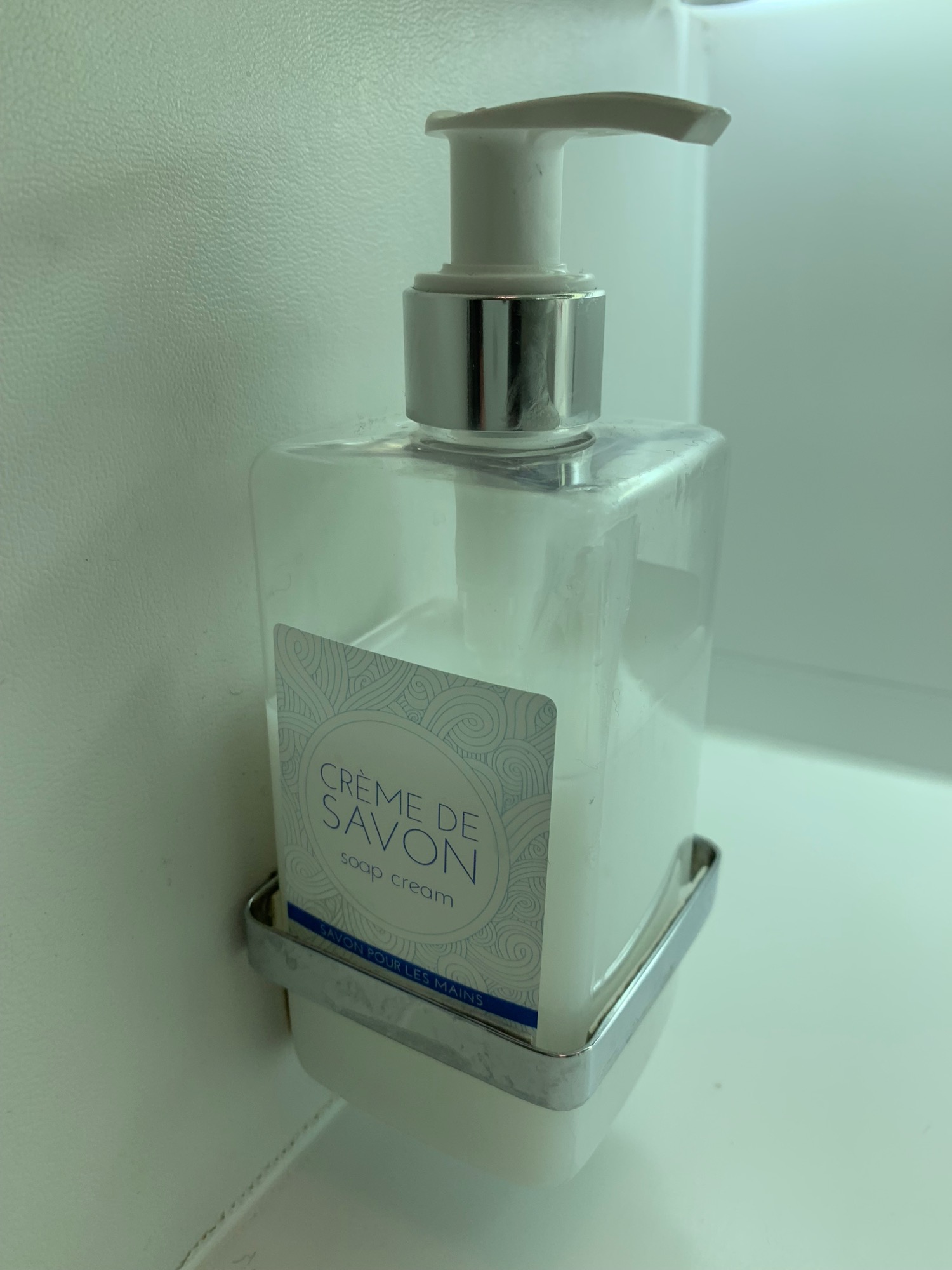 a soap dispenser on a counter