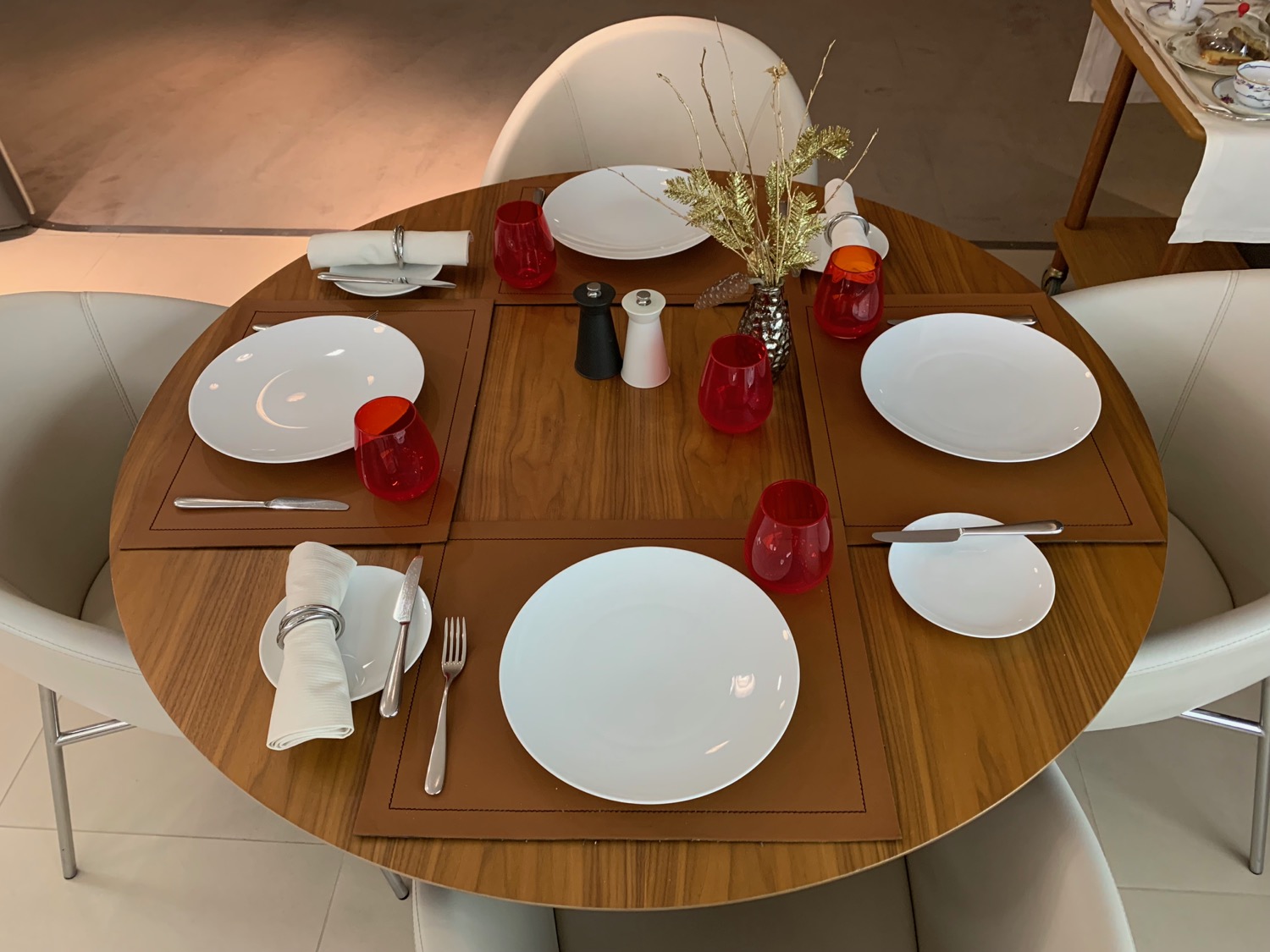 a table with plates and cutlery