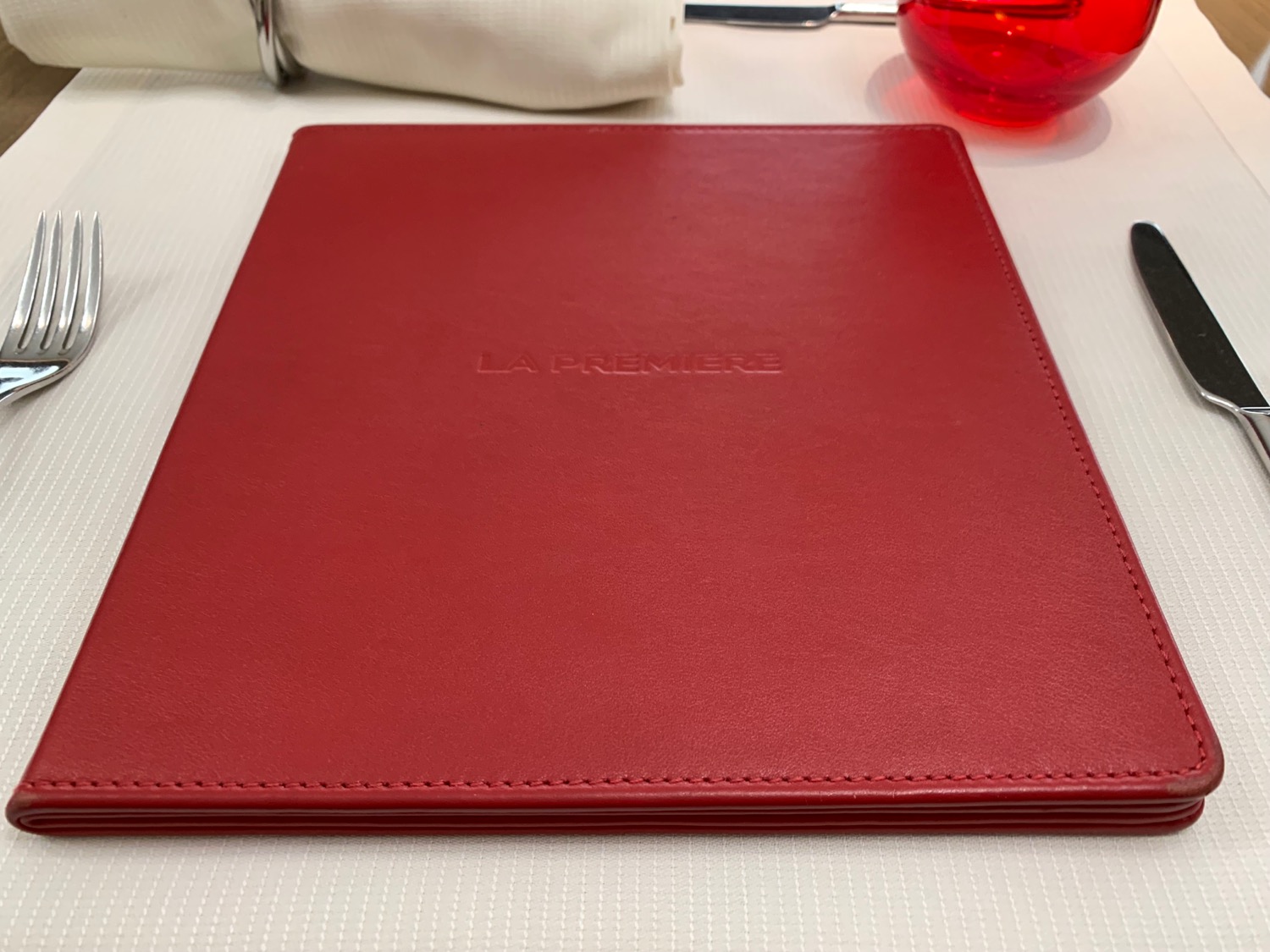 a red leather cover on a table