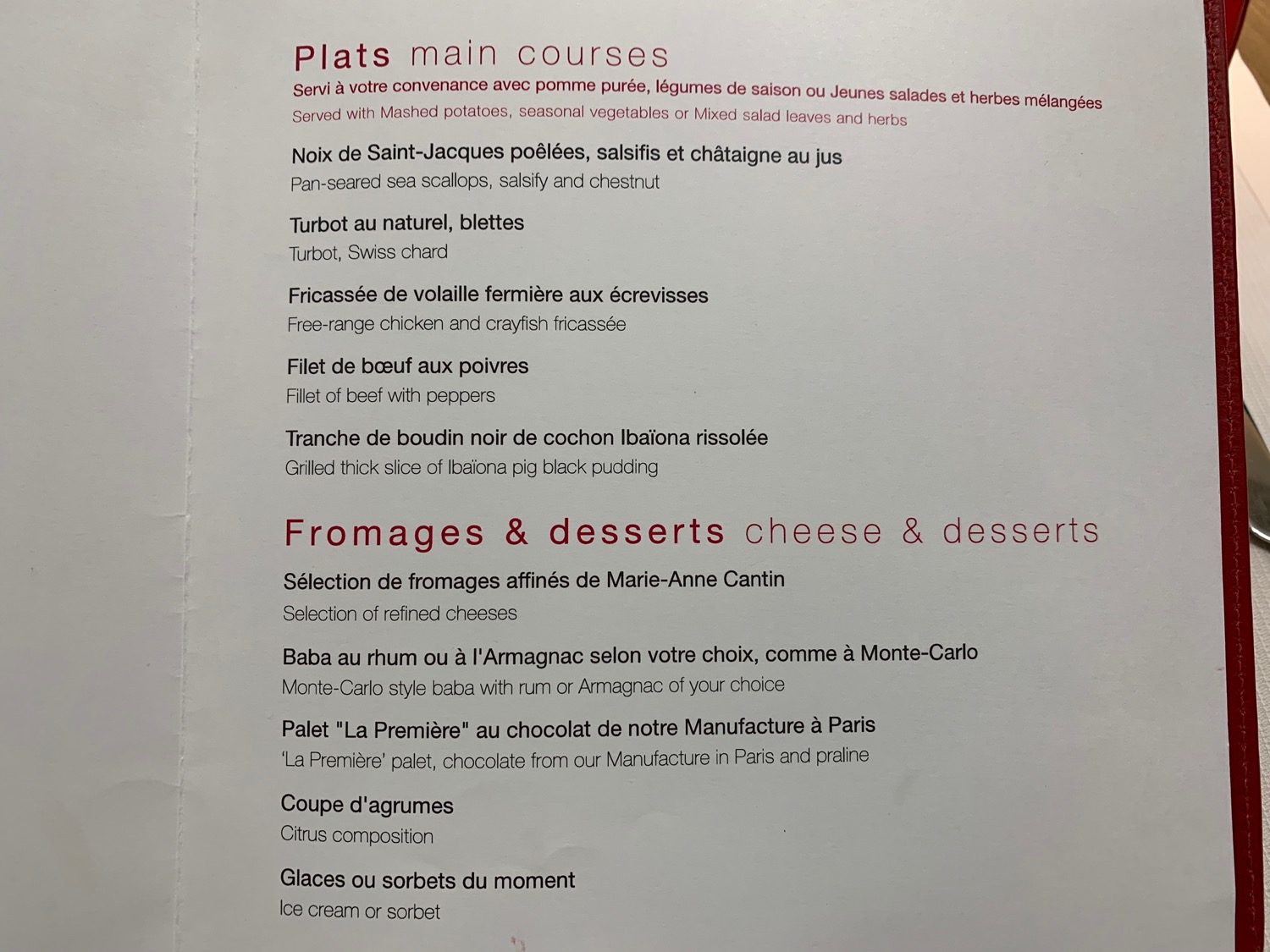 a menu with red text