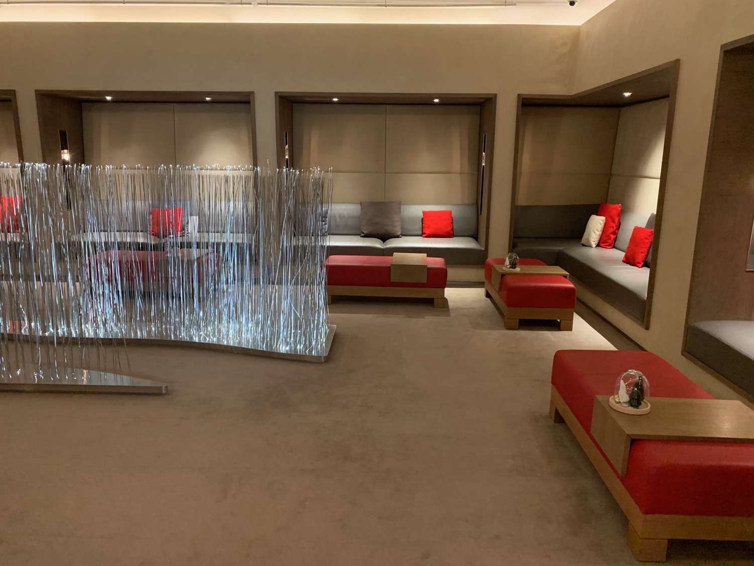 a room with a glass curtain and a couch