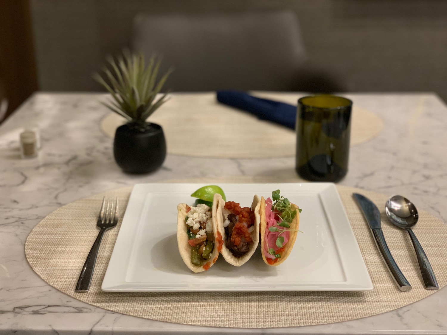 a plate of tacos on a table