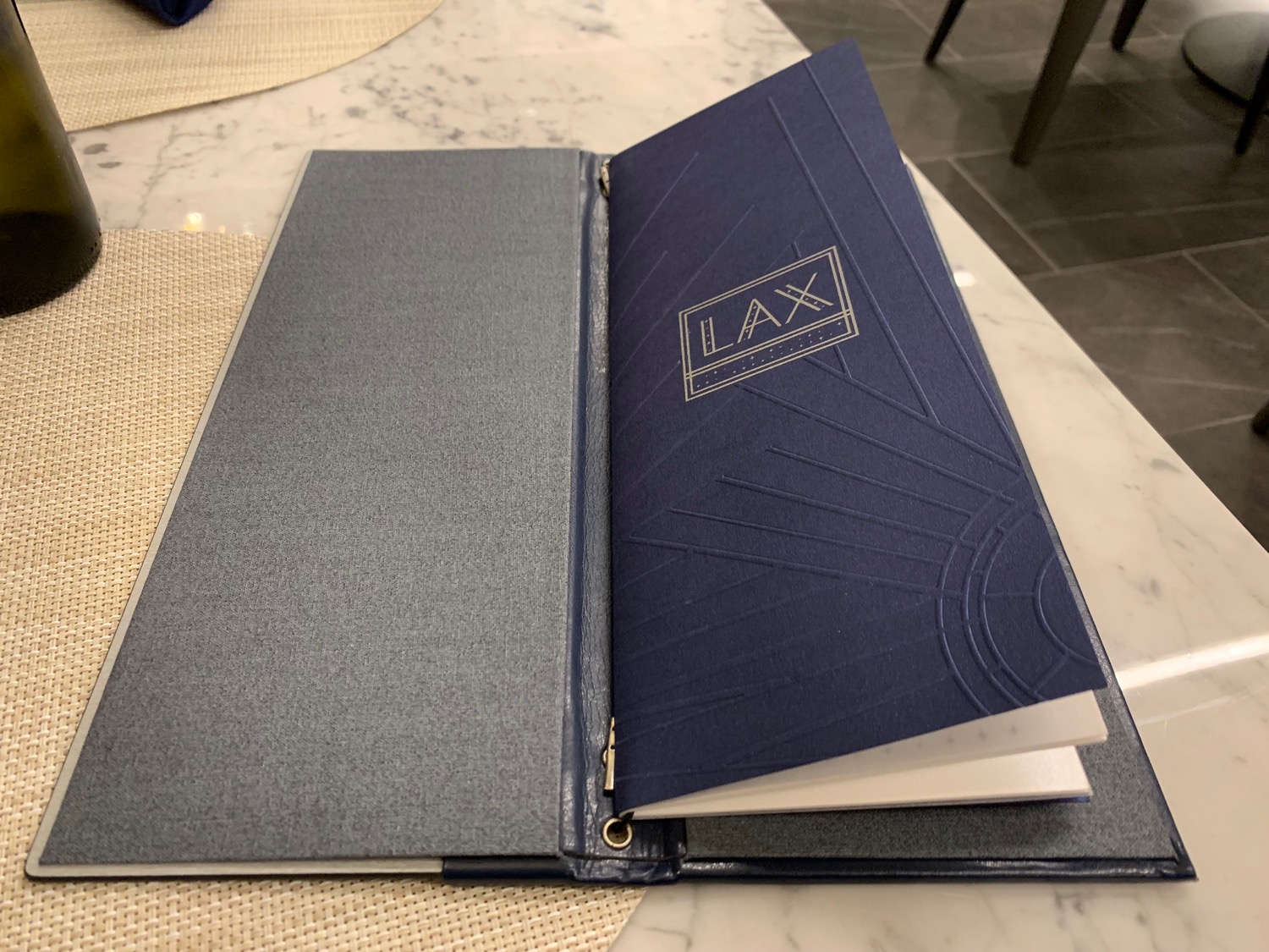 a blue book with a logo on it