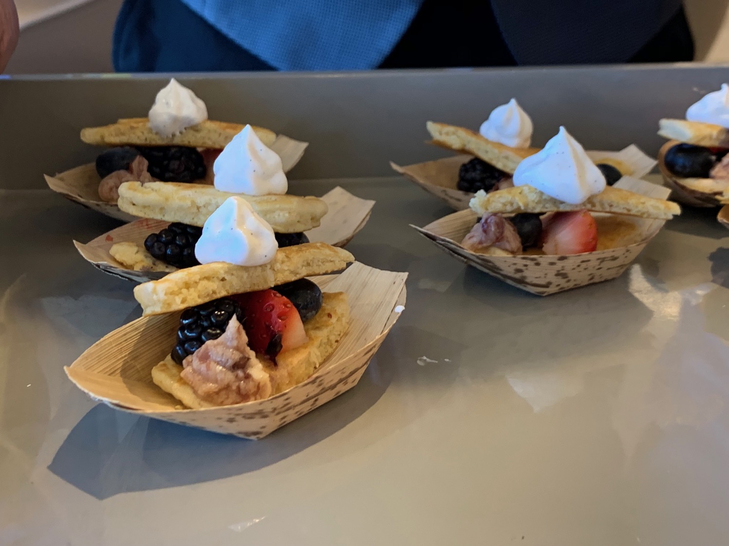 a group of small desserts on a table