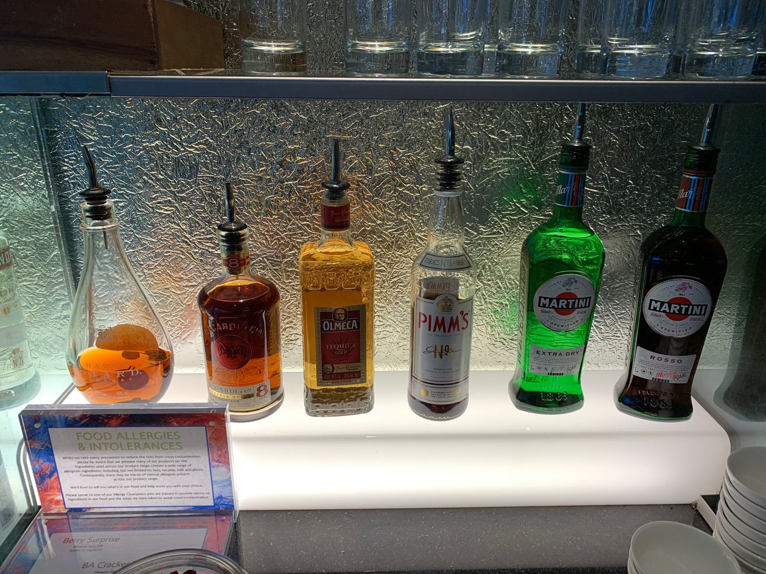 a row of liquor bottles on a shelf