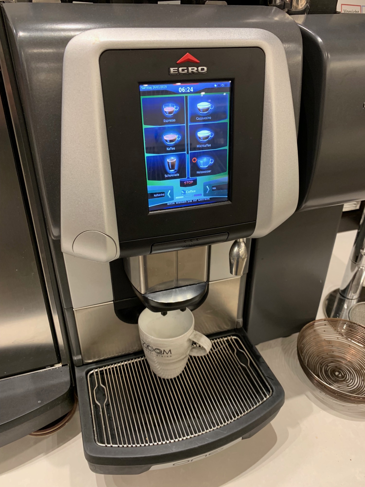 a coffee machine with a screen