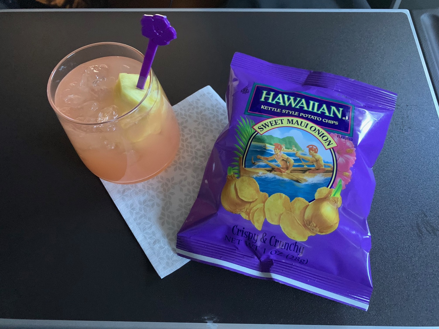 a drink and a bag of chips