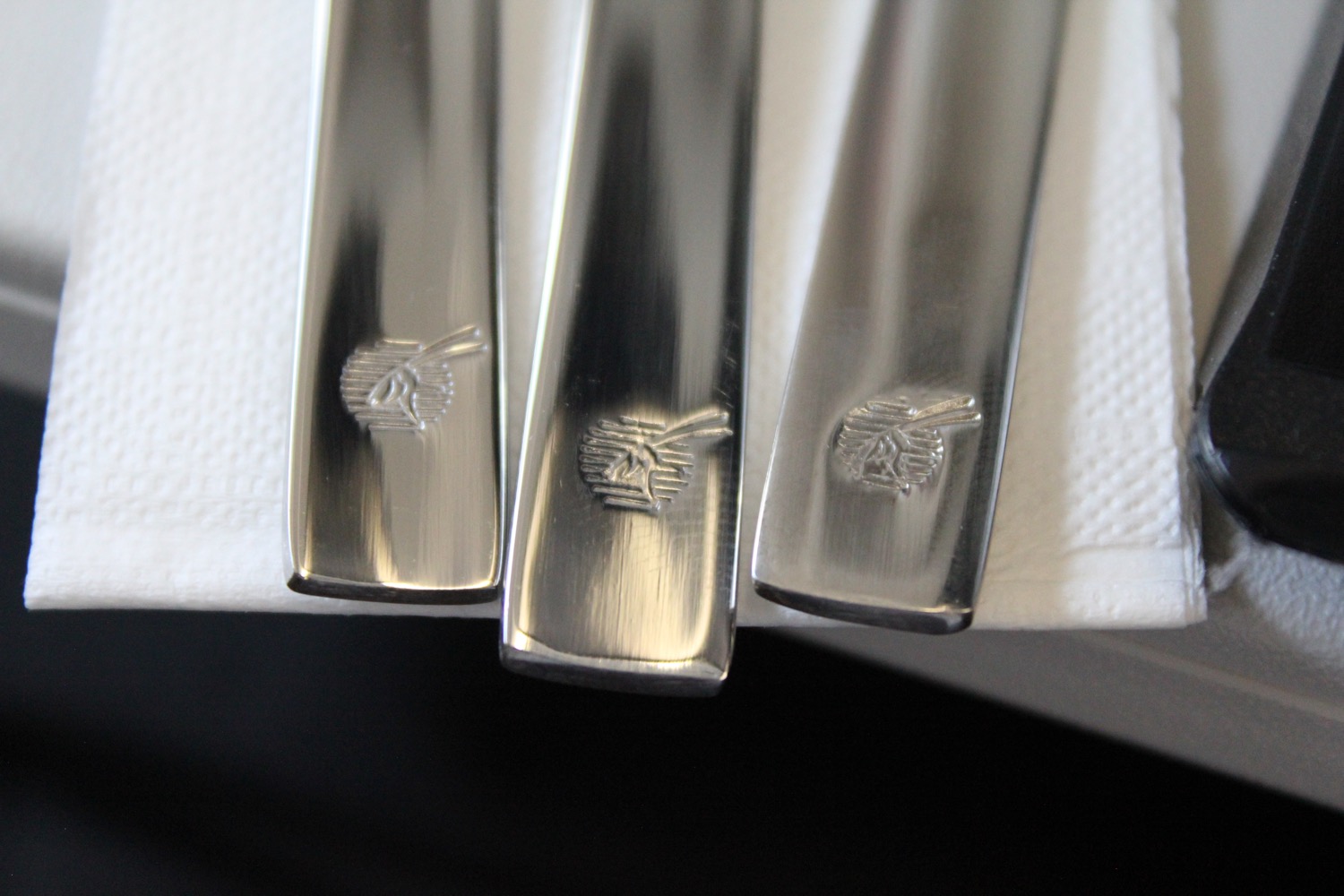 a close up of a group of silverware