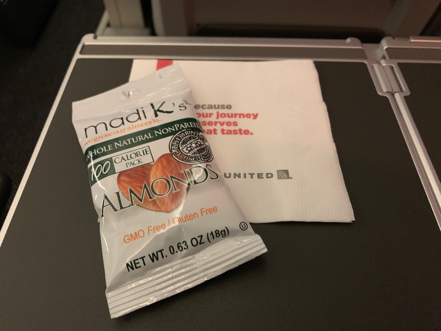 a small packet of almonds on a napkin