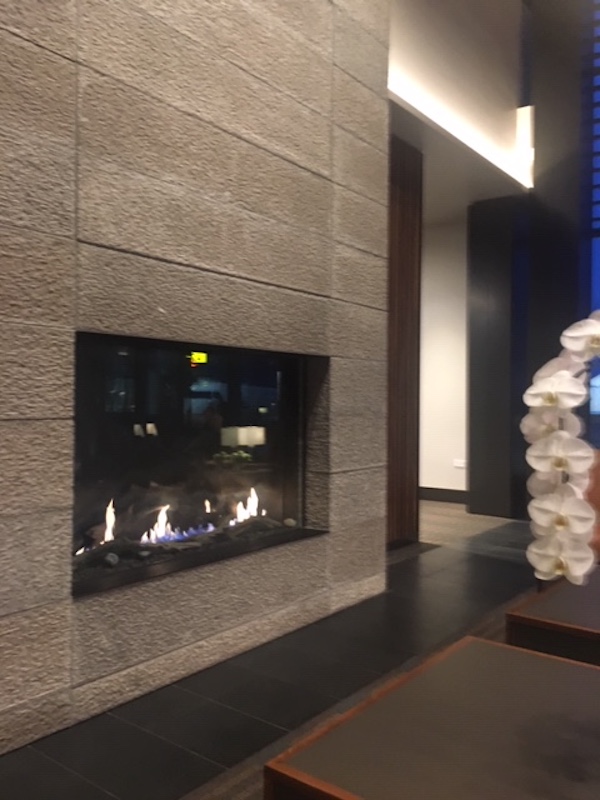 Mother likes fireplaces in airports
