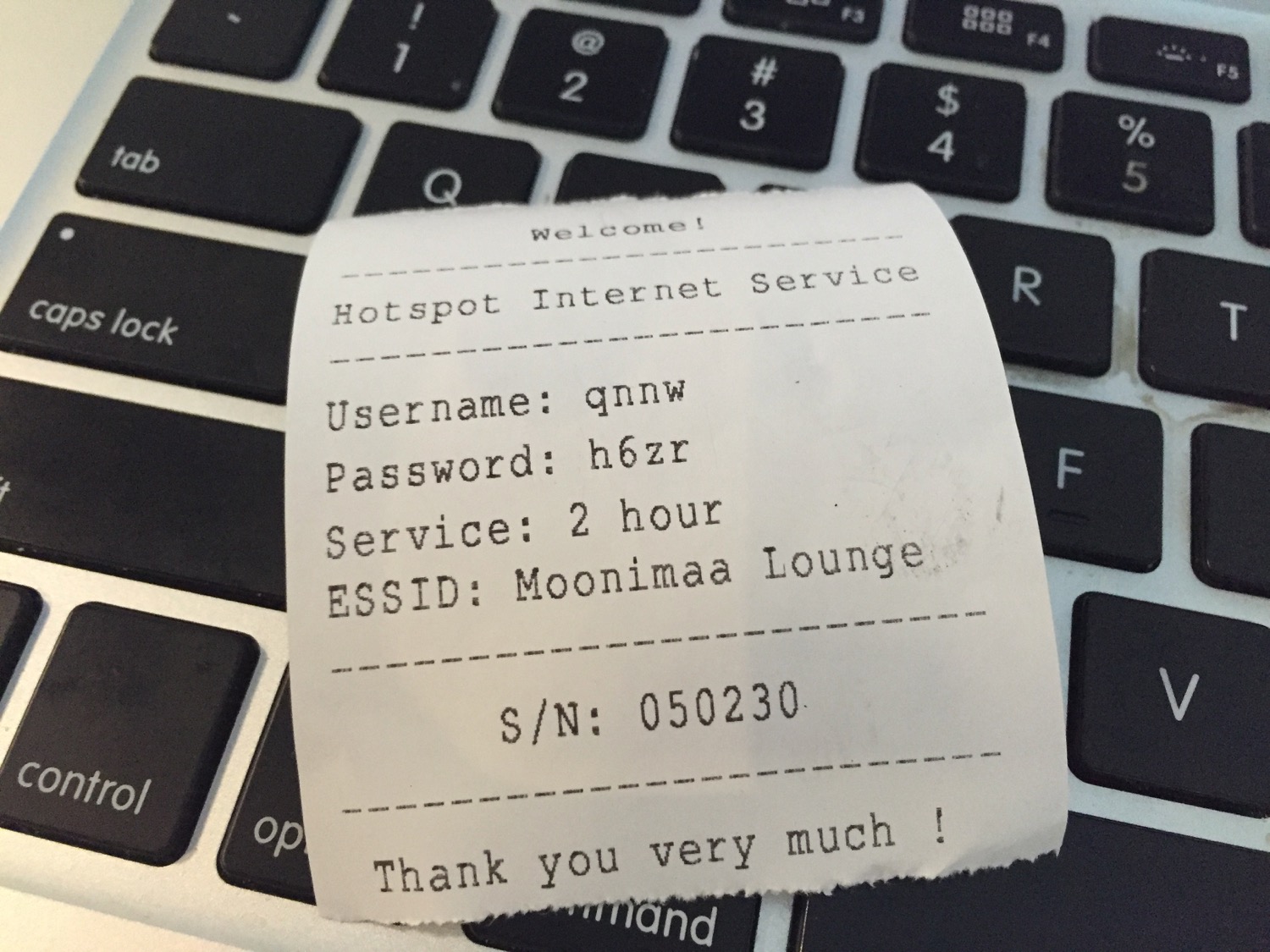 a paper receipt on a keyboard