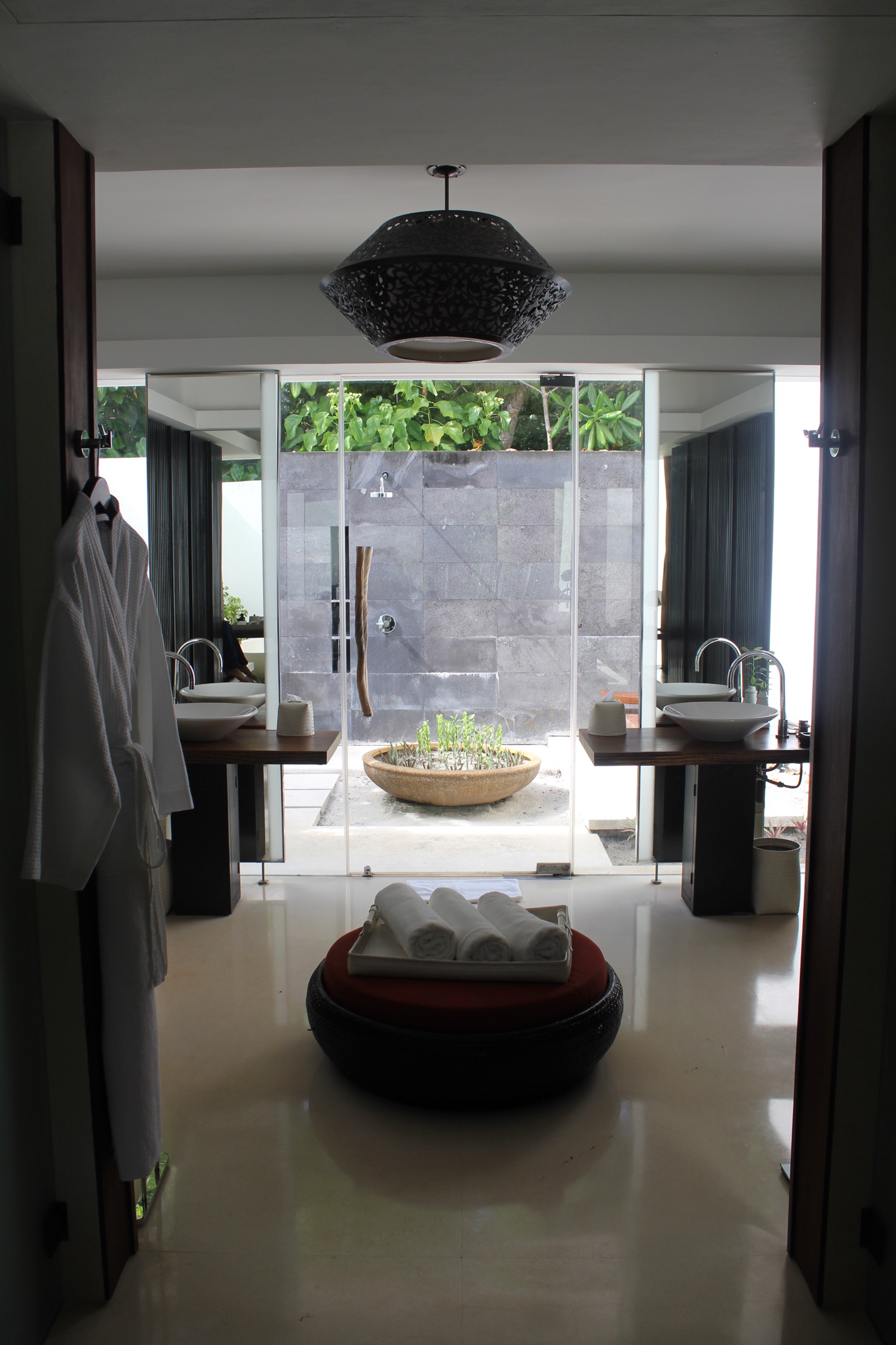 a bathroom with a large glass door