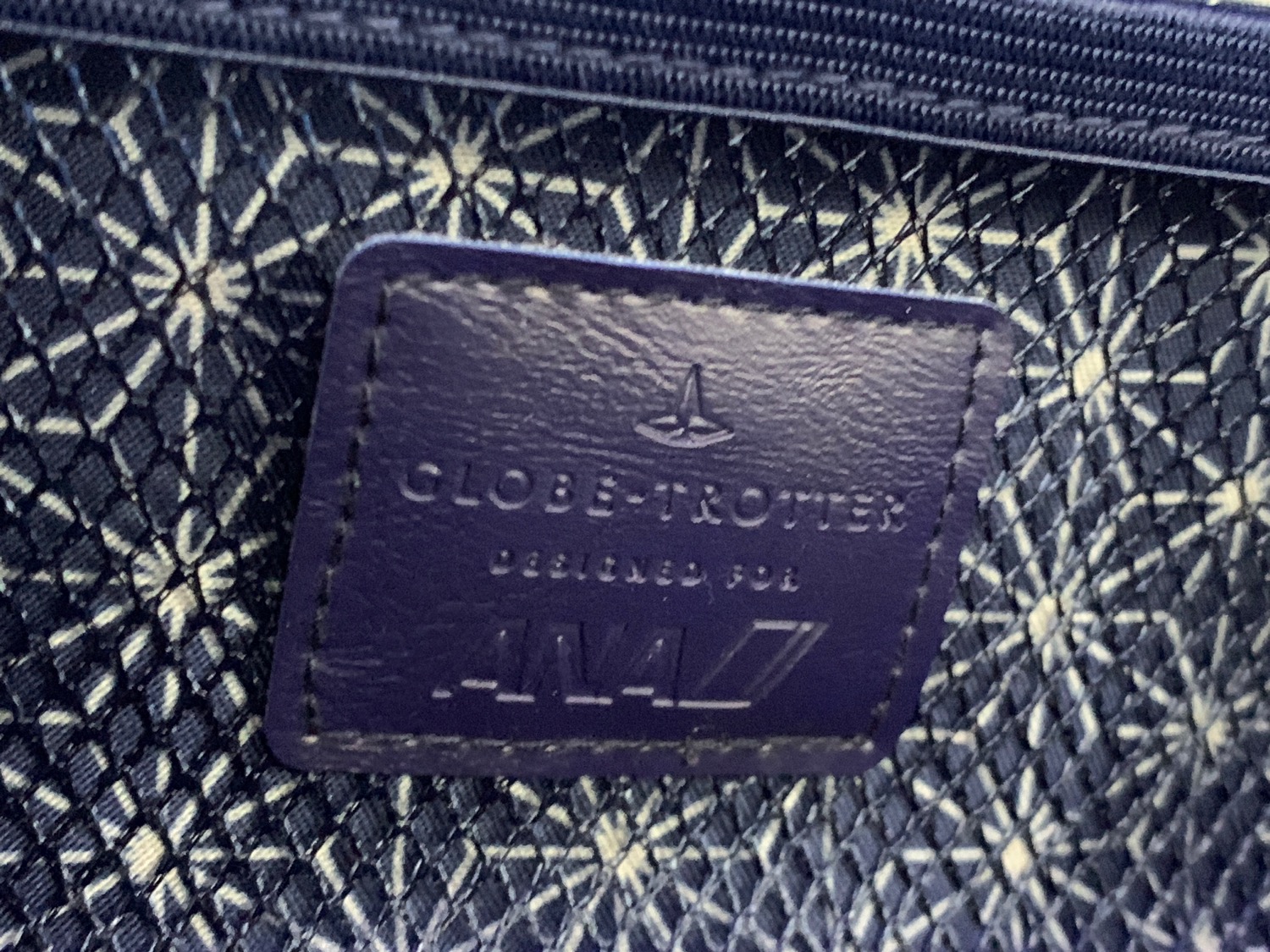a close up of a leather label