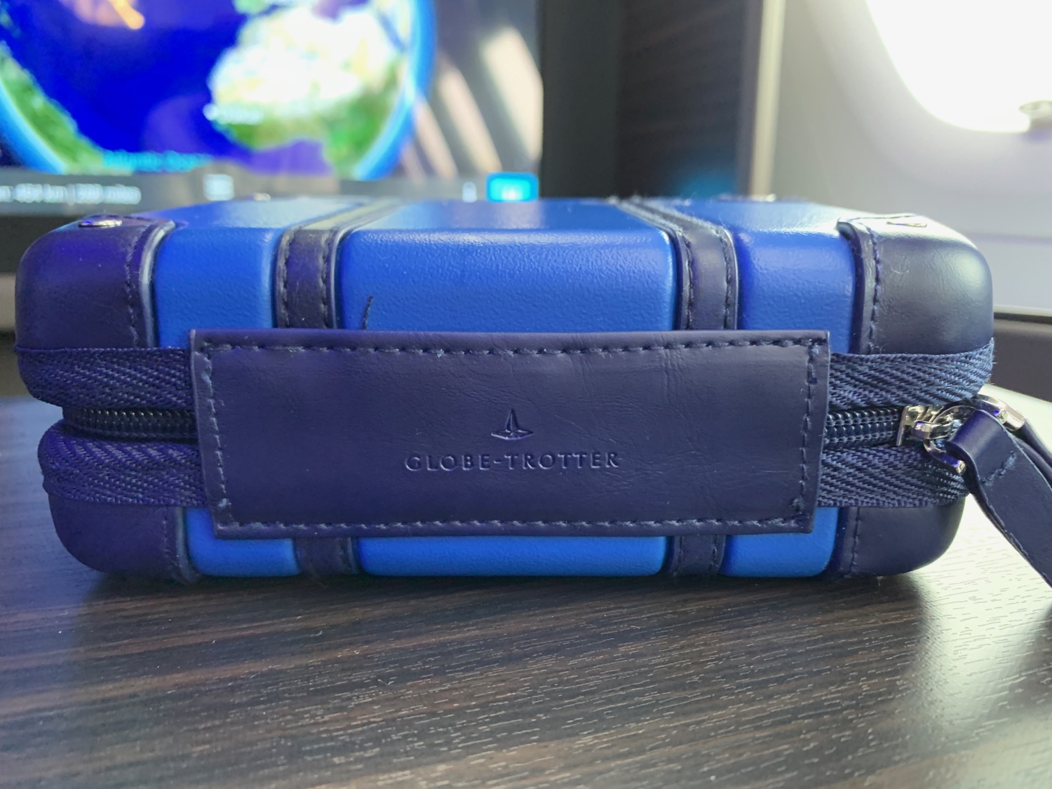 a blue and black leather case