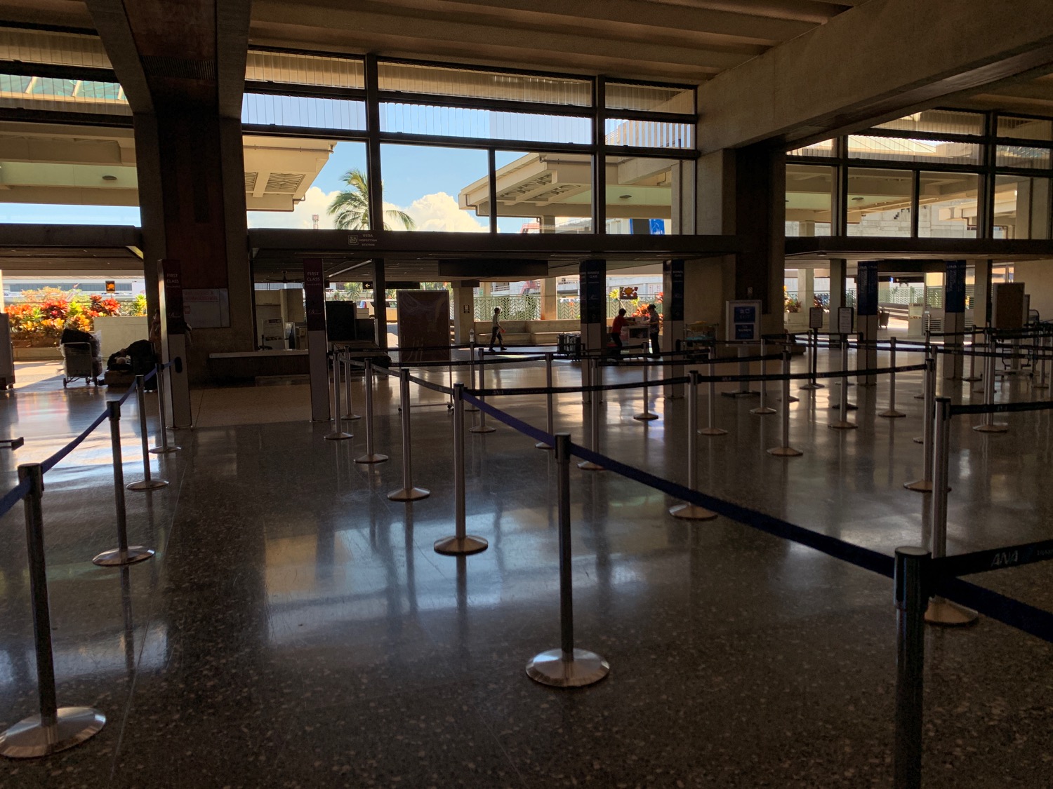 a airport with a line of barriers