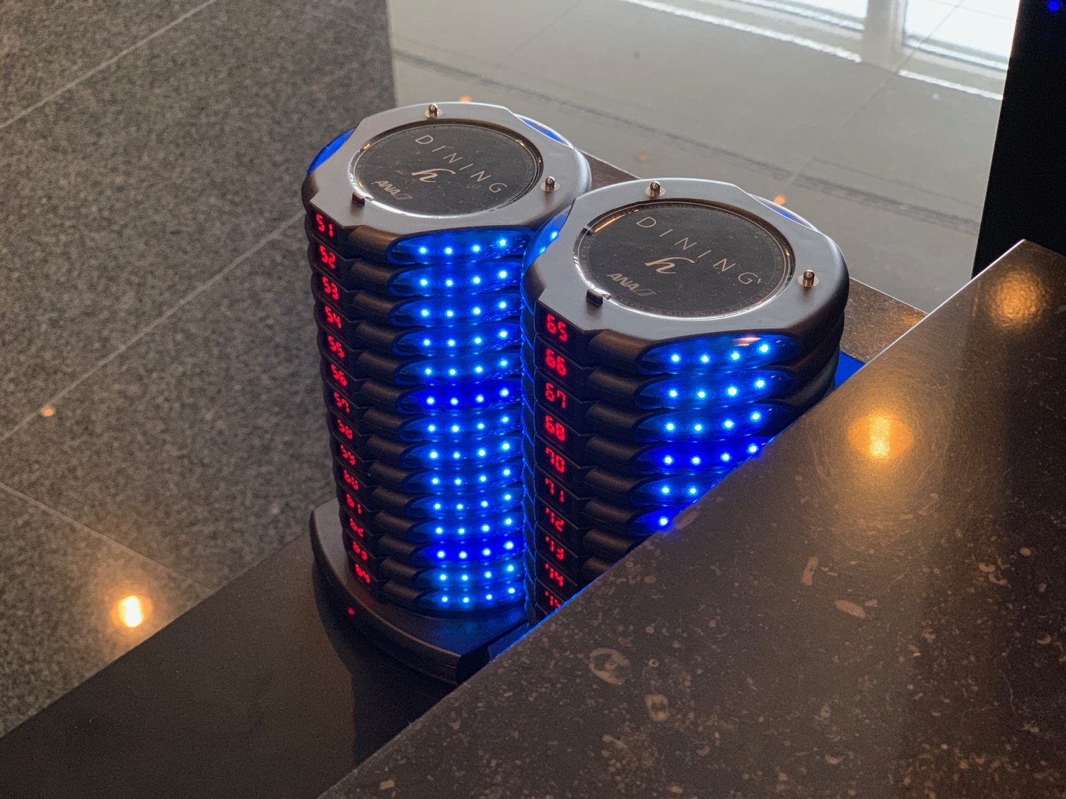 a group of black and blue lights on a counter