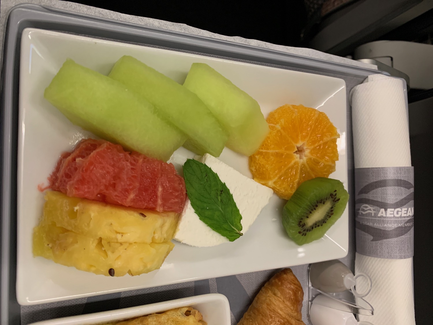 a plate of fruit on a tray