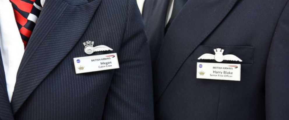 a close-up of a couple of men wearing pinstriped suits